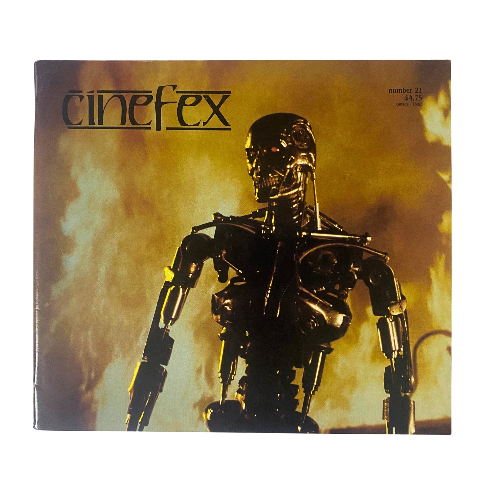 Cinefex Magazine April 1985 No. 21 featuring The Terminator on the cover, showcasing an iconic cyborg endoskeleton emerging from flames.