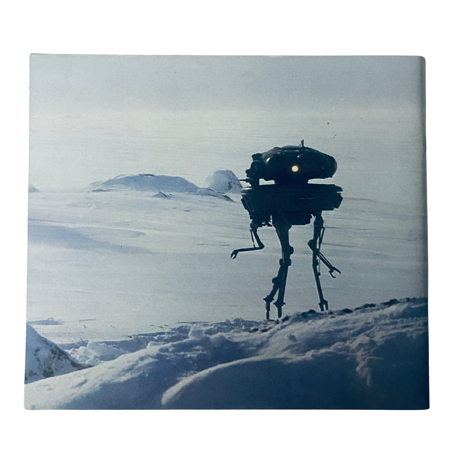 Cover image of Cinefex Magazine December 1980 No. 3 featuring an Imperial probe droid from The Empire Strikes Back standing in a snowy landscape, showcasing the artistry behind special effects in cinema.