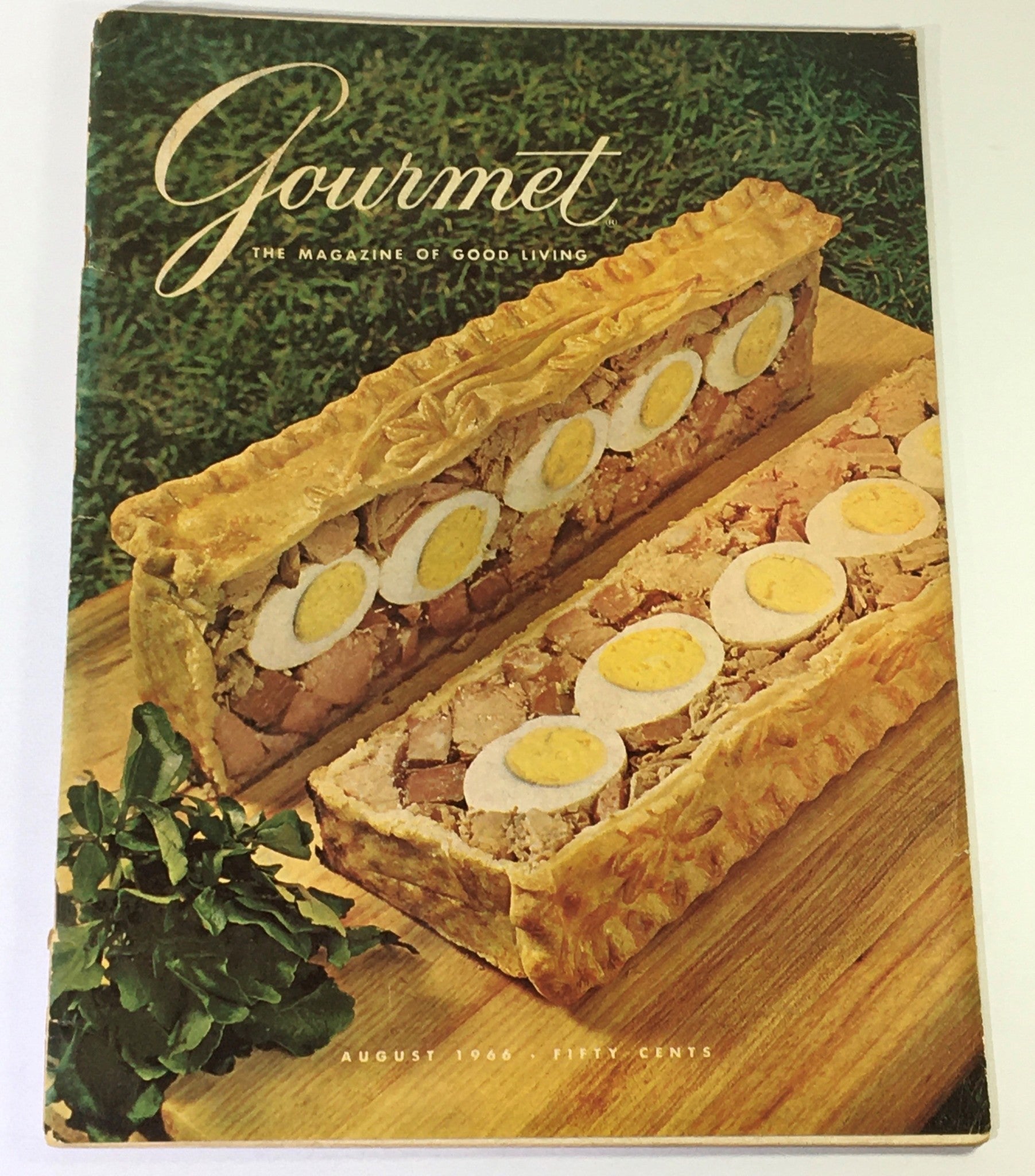 Cover of VTG Gourmet magazine from August 1966 featuring a unique culinary dish with eggs and meat, showcasing the theme "The Pyranees Provinces" in vintage style.