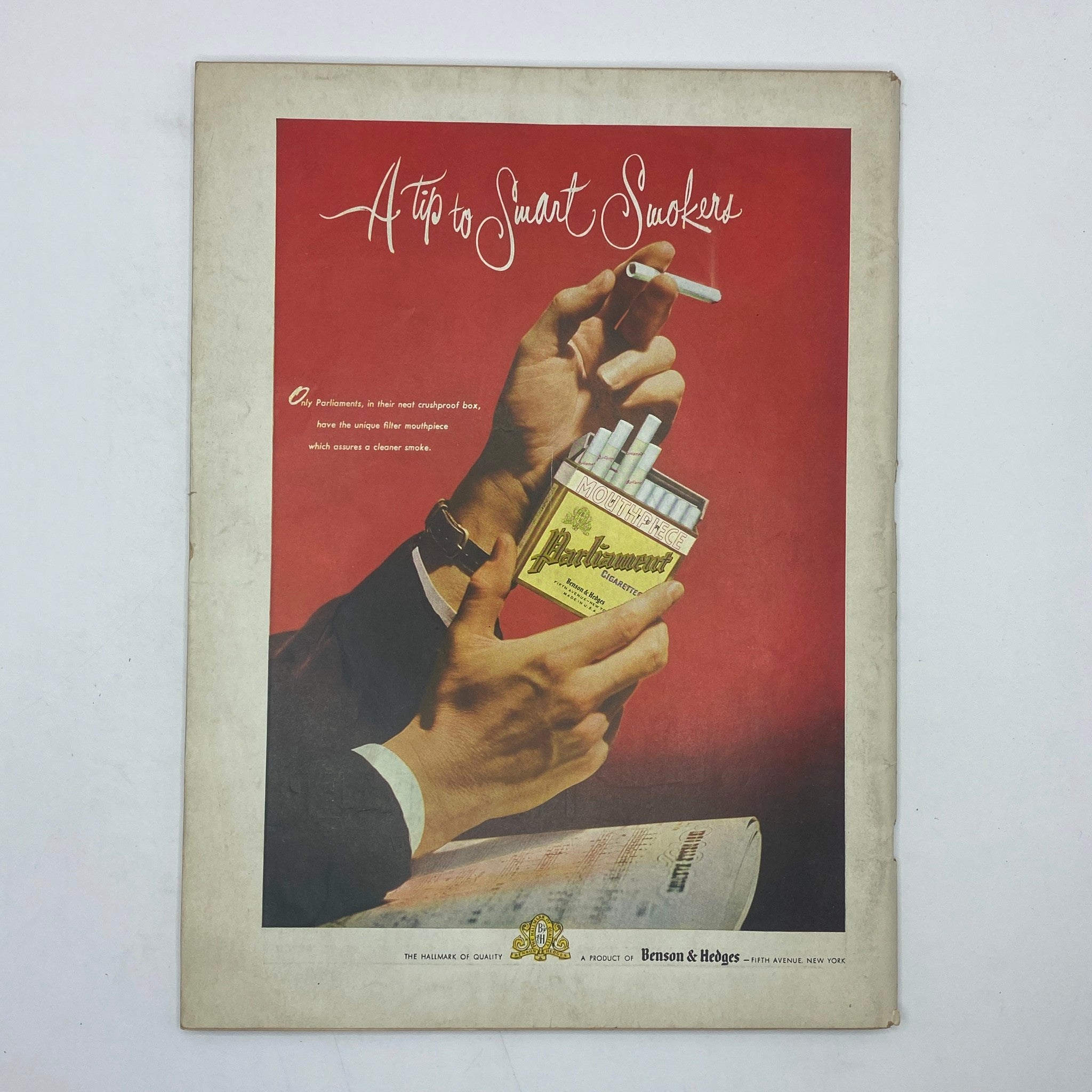 Vintage advertisement from The New Yorker Complete Magazine November 22, 1947 featuring a stylish illustration of hands holding Parliament cigarettes with the slogan 'A Tip to Smart Smokers'.