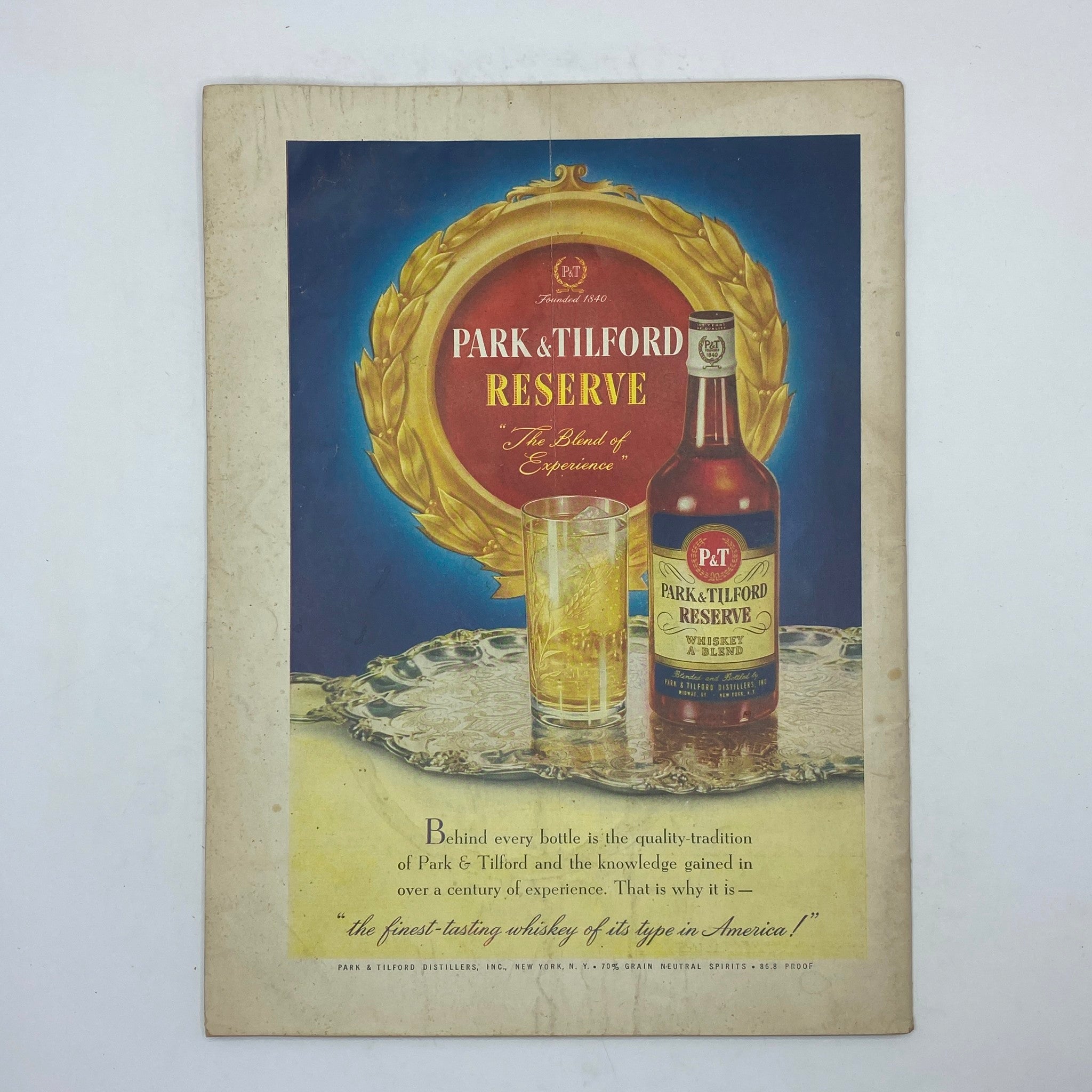 Vintage advertisement for Park & Tilford Reserve whiskey featuring a bottle and glass, showcasing the tagline 'The Blend of Experience', from The New Yorker magazine dated September 6, 1947.