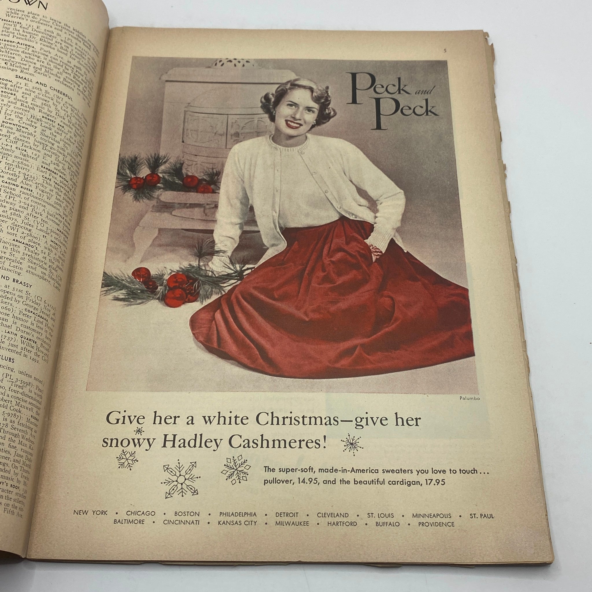 Vintage advertisement page with a woman in a red skirt sitting by a fireplace, promoting Hadley Cashmeres, from The New Yorker Complete Magazine November 29, 1947.