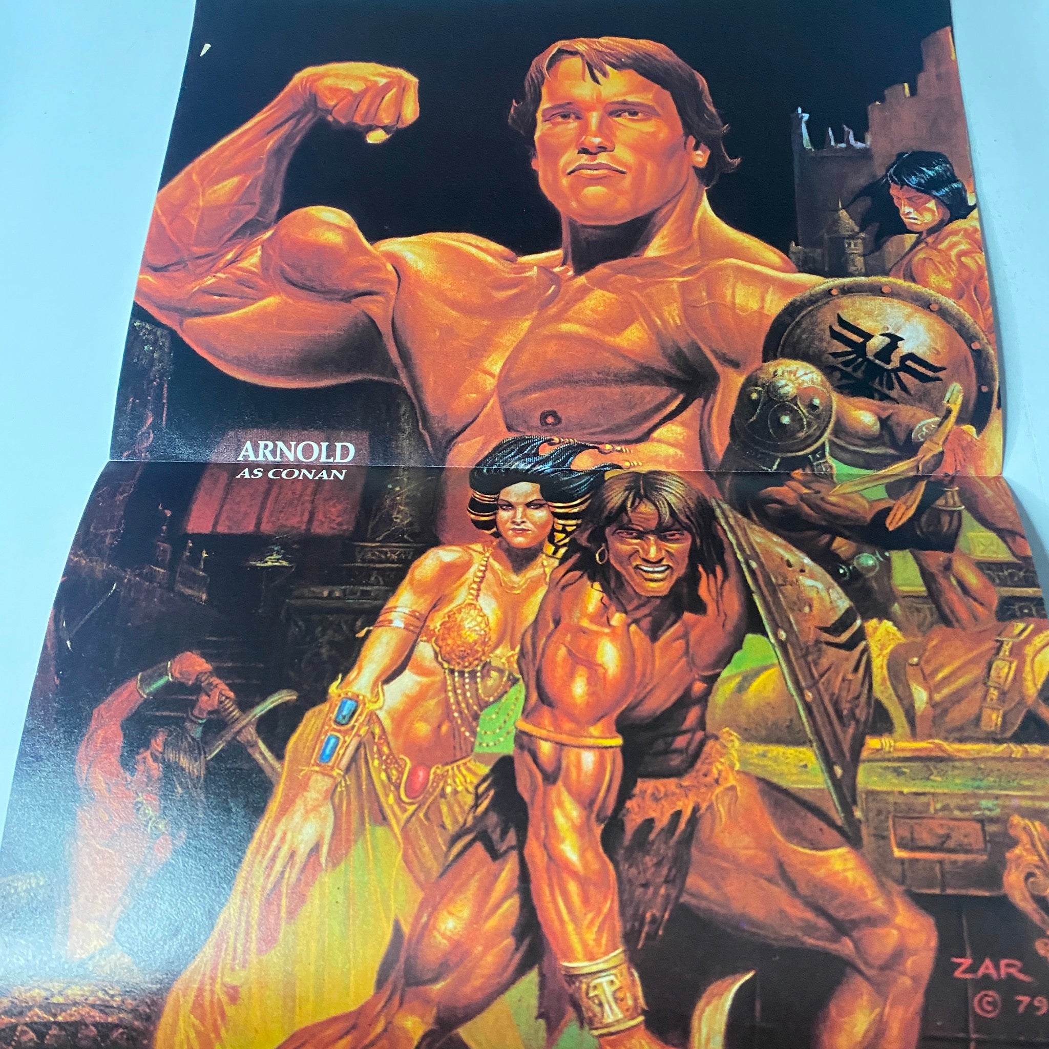 Joe Weider's Muscle Magazine May 1980 featuring Arnold Schwarzenegger as Conan with a vibrant illustration of iconic characters.