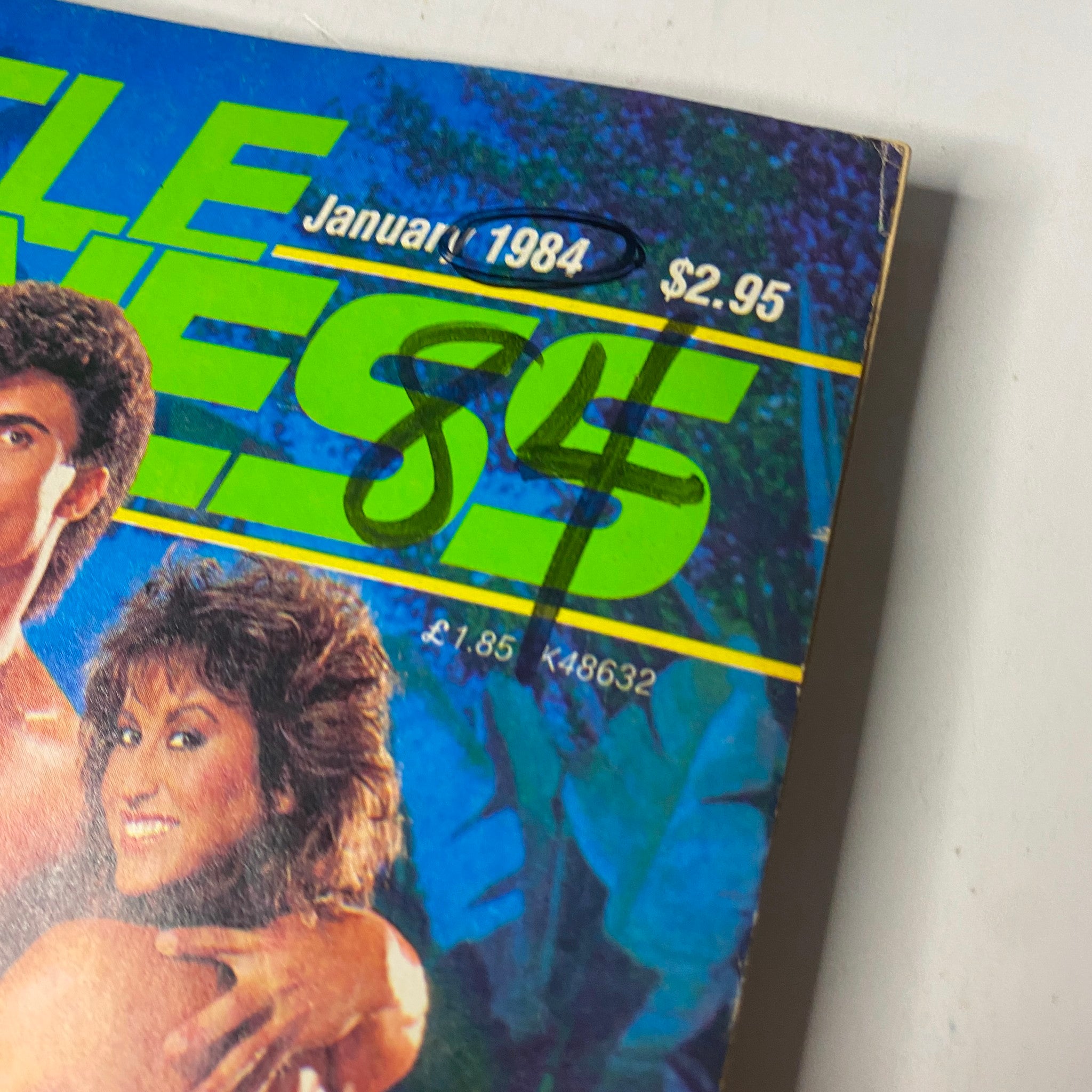 Close-up view of the Muscle & Fitness Magazine January 1984 cover, showcasing the publication's title and price, with emphasis on fitness and bodybuilding themes.
