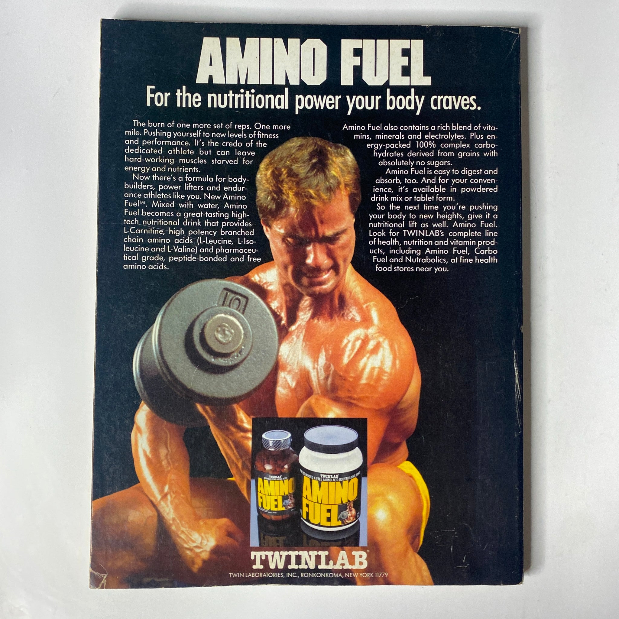 Back cover of Muscle & Fitness Magazine June 1987 advertising Amino Fuel nutritional supplement with a muscular bodybuilder, promoting fitness and health.