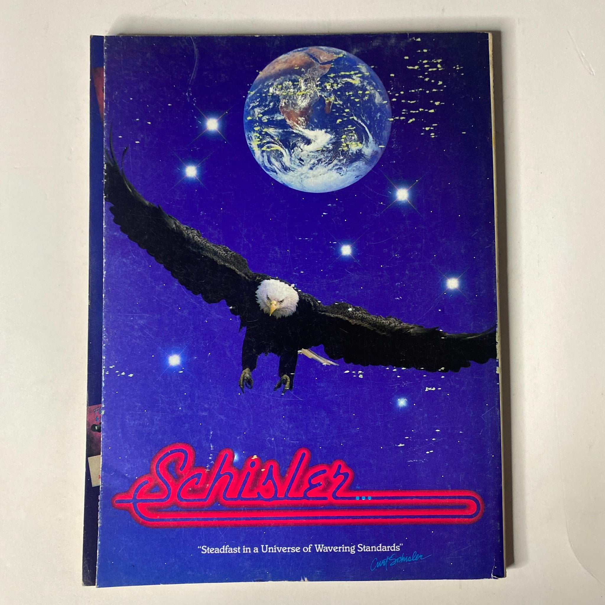 Back cover of Muscle & Fitness Magazine May 1988 with an artistic design featuring a soaring eagle against a starry background.