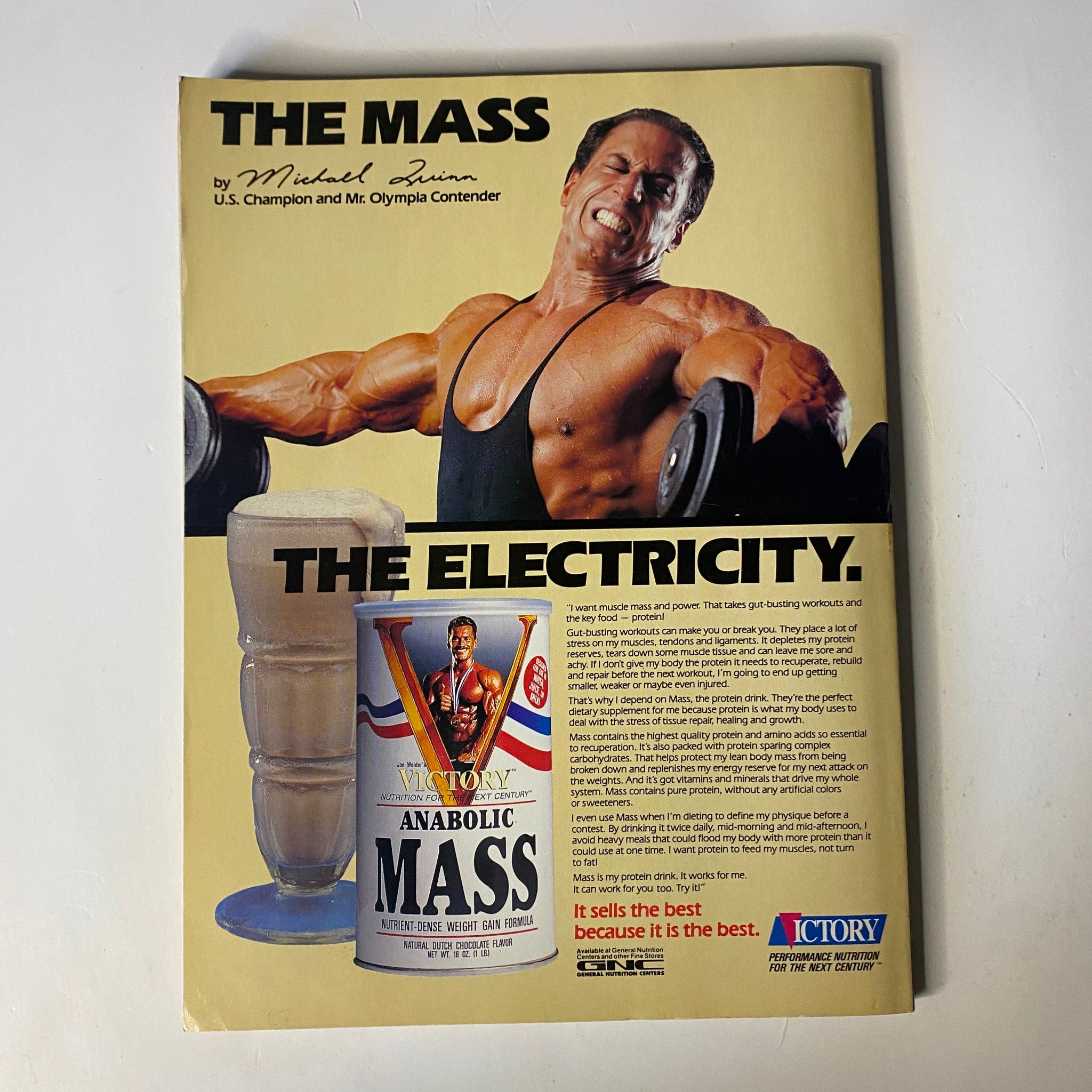 Muscle & Fitness Magazine May 1990 advertisement featuring a U.S. Champion discussing the 'Victory Anabolic Mass' protein supplement, promoting muscle building.