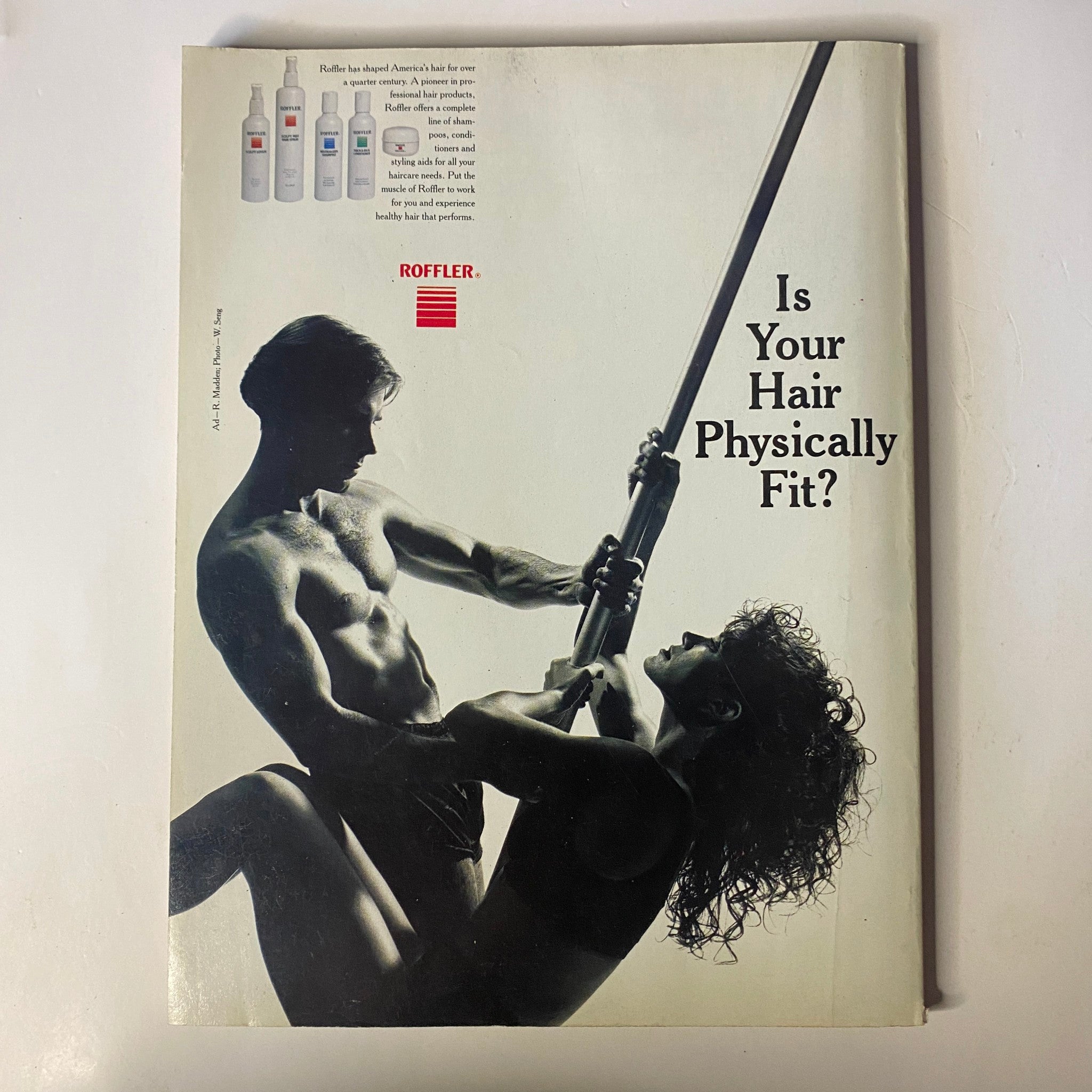 Cover image of Muscle & Fitness Magazine June 1990 featuring an artistic photo of a male and female model with the text 'Is Your Hair Physically Fit?' highlighting the magazine's focus on fitness and health trends. This issue includes contributions from fitness legends and explores advancements in bodybuilding.