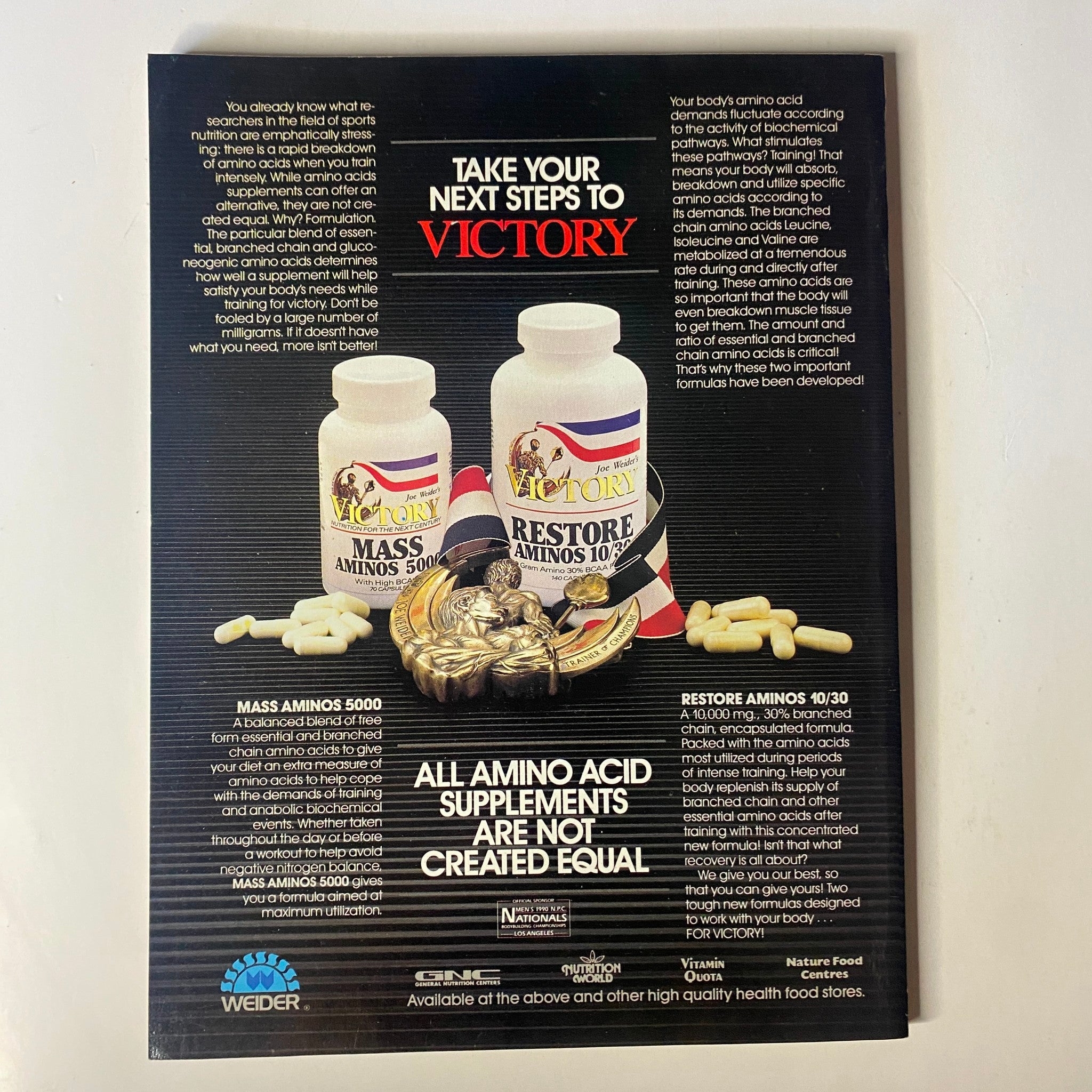Advertisement for Victory Amino Acid Supplements featuring Mass Aminos 5000 and Restore Aminos 10. Take your next steps to victory with health-focused products. Muscle & Fitness Magazine October 1990 Vol 51 No. 10 Bob Paris—No Label.