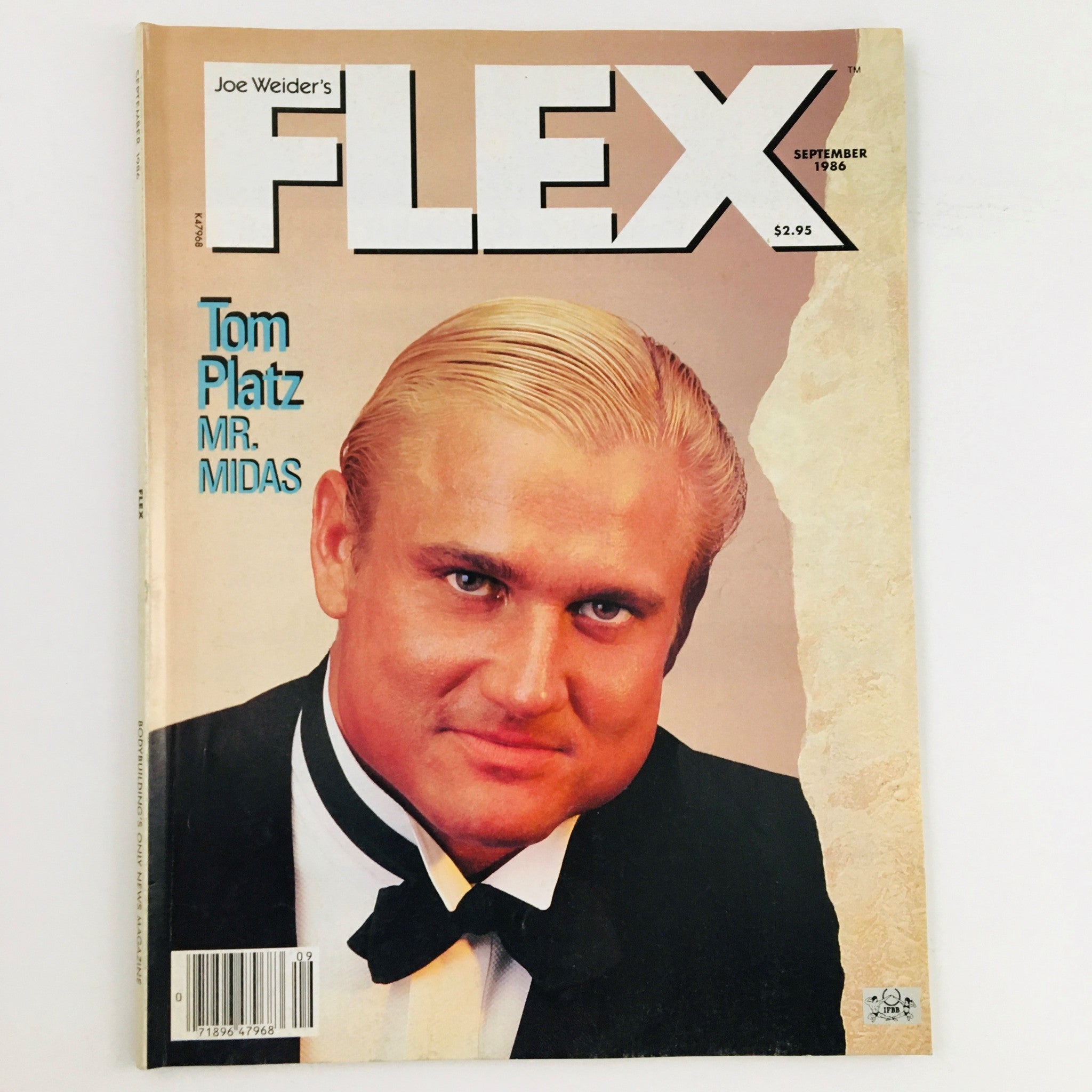 Cover of Joe Weider's Flex Magazine from September 1986 featuring bodybuilder Tom Platz, known as Mr. Midas, dressed in a tuxedo with a bow tie, highlighting the vintage bodybuilding culture.