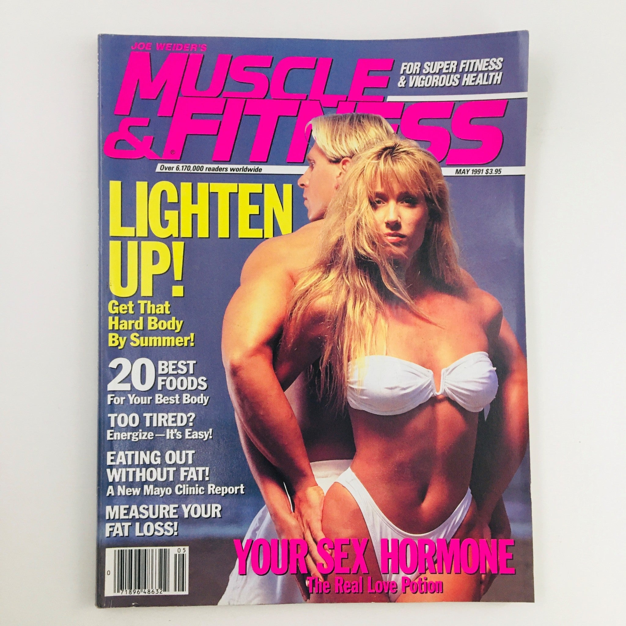 Cover of Muscle & Fitness Magazine May 1991 featuring a fitness model and male athlete, promoting fitness tips and nutrition for summer body preparation.