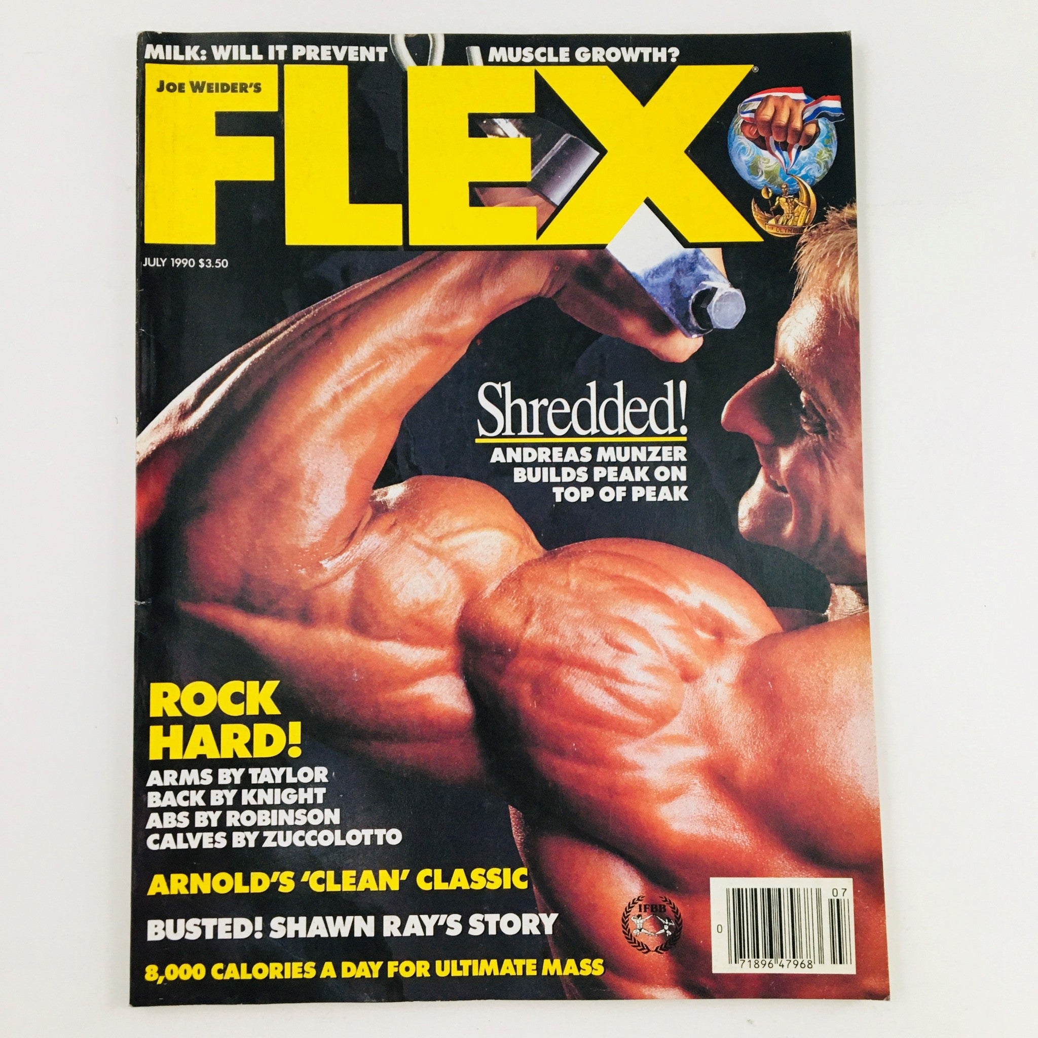 Cover image of Joe Weider's Flex Magazine, July 1990, featuring Andreas Munzer with the headline 'Shredded! Andreas Munzer Builds Peak on Top of Peak.' A striking showcase of bodybuilding aesthetics.