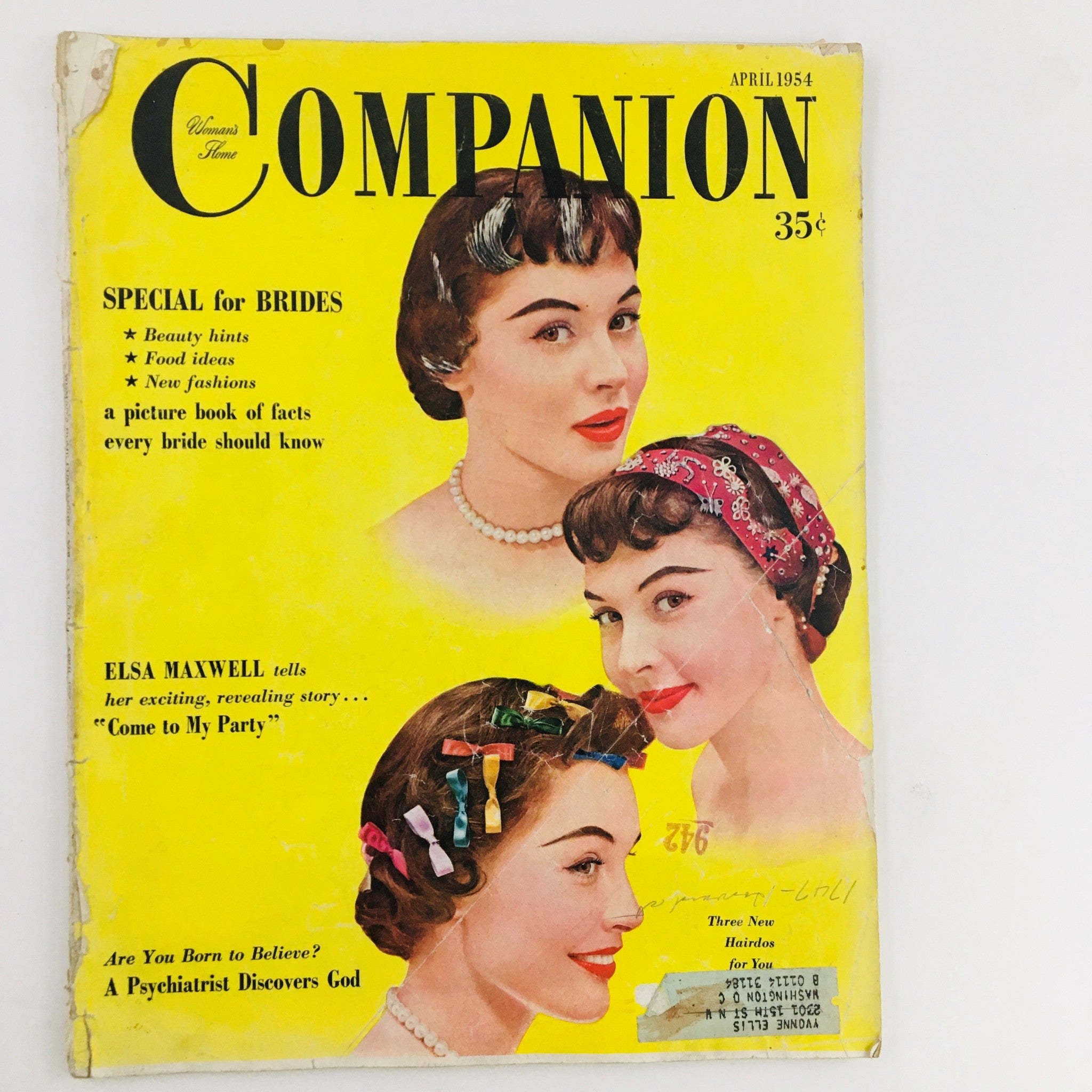 Woman's Home Companion April 1954 magazine cover featuring Elsa Maxwell's article 'Tell Her Exciting Revealing Story', with images of women showcasing hairstyles, vibrant yellow background, and special features for brides.