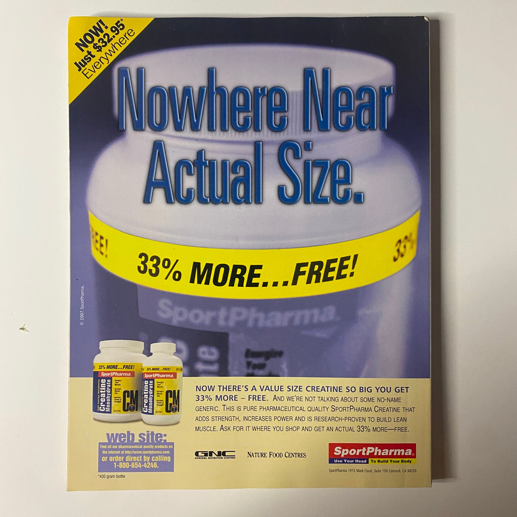 Advert of SportPharma from Muscle & Fitness Magazine February 1998 Vol 59 No. 2, promoting a value size creatine supplement with a promotional offer.