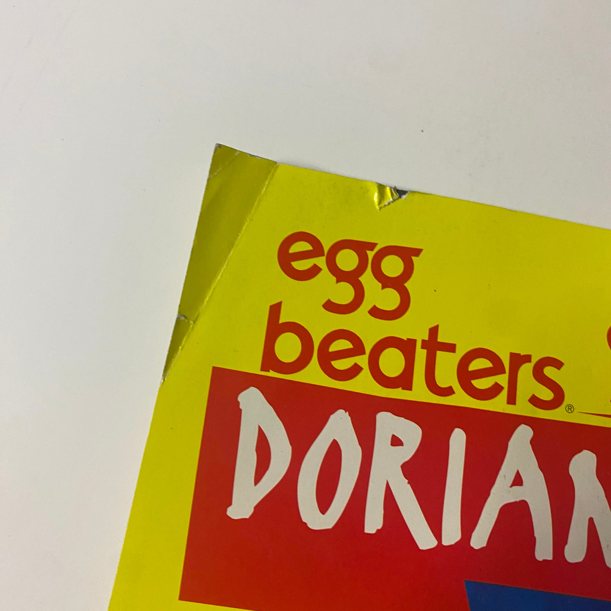 Close-up of Egg Beaters advertisement with Dorian Yates, highlighting dietary benefits and featuring a colorful design focused on fitness and health.