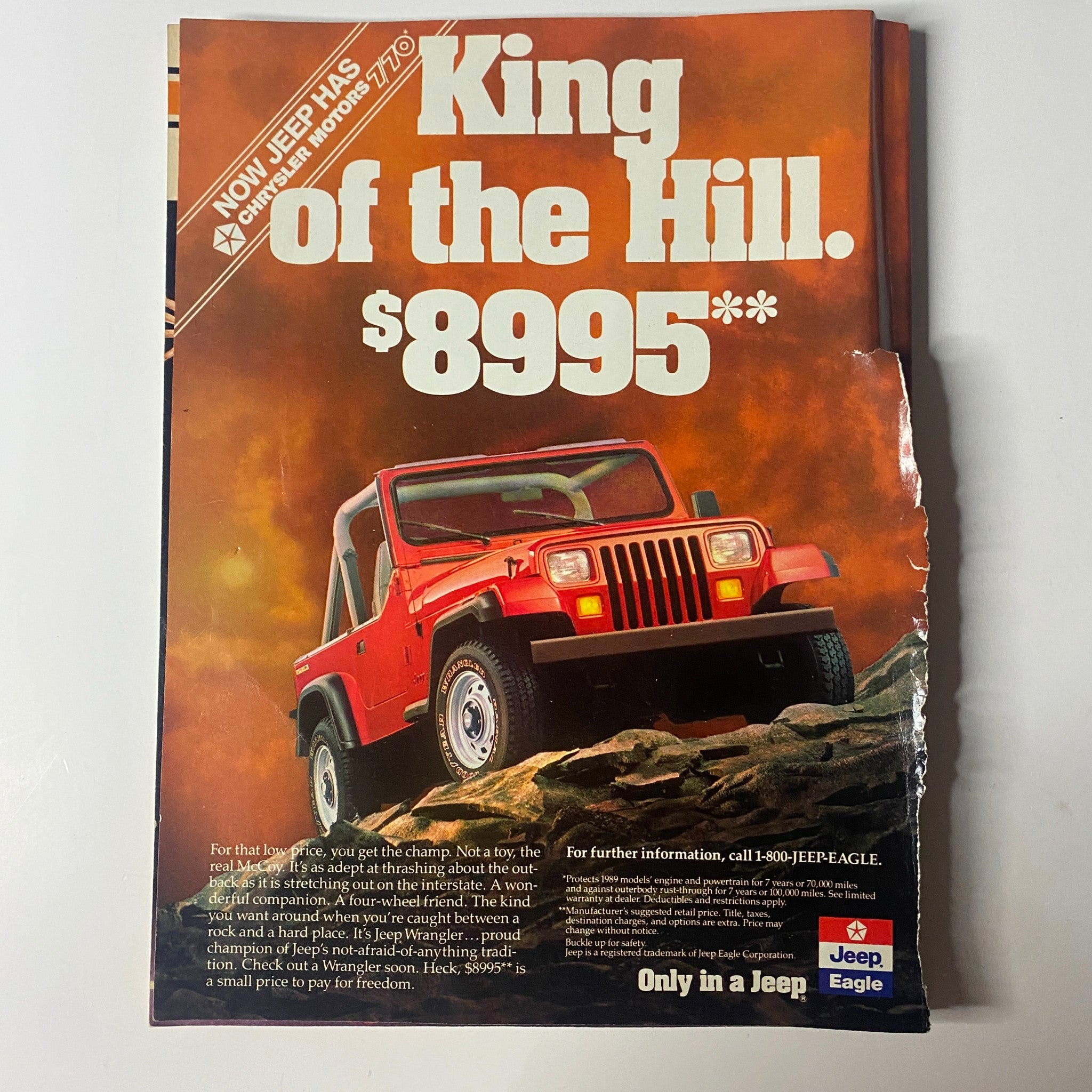 Advertisement from Muscle & Fitness Magazine April 1989 for Jeep, featuring a red Jeep vehicle and promotional pricing.