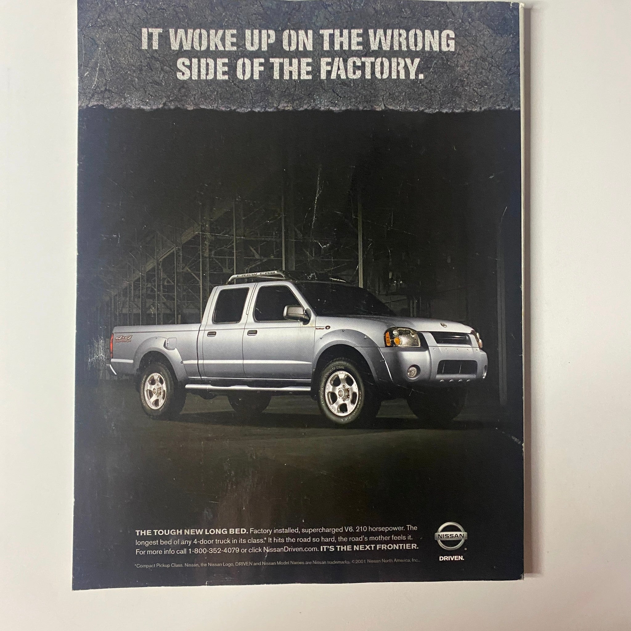 Back cover of Muscle & Fitness Magazine November 2001 featuring a Nissan pickup truck advertisement.