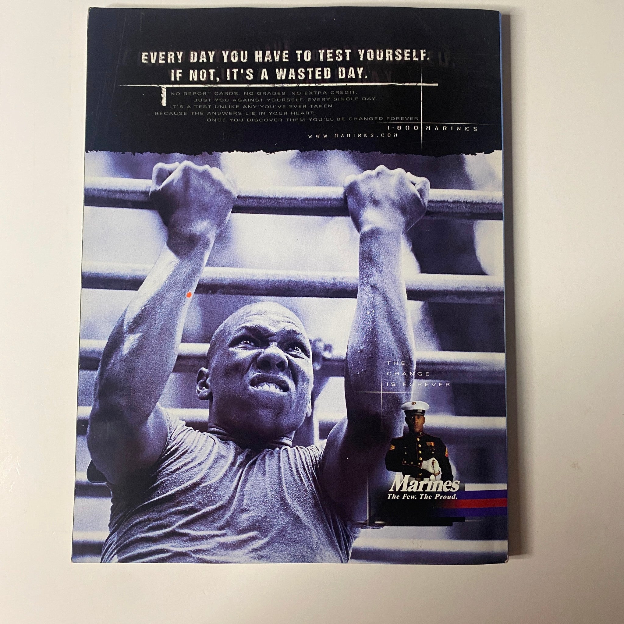 Back cover of Muscle & Fitness Magazine May 2001 featuring a motivational Marines advertisement. The design emphasizes the theme of physical fitness and personal discipline.