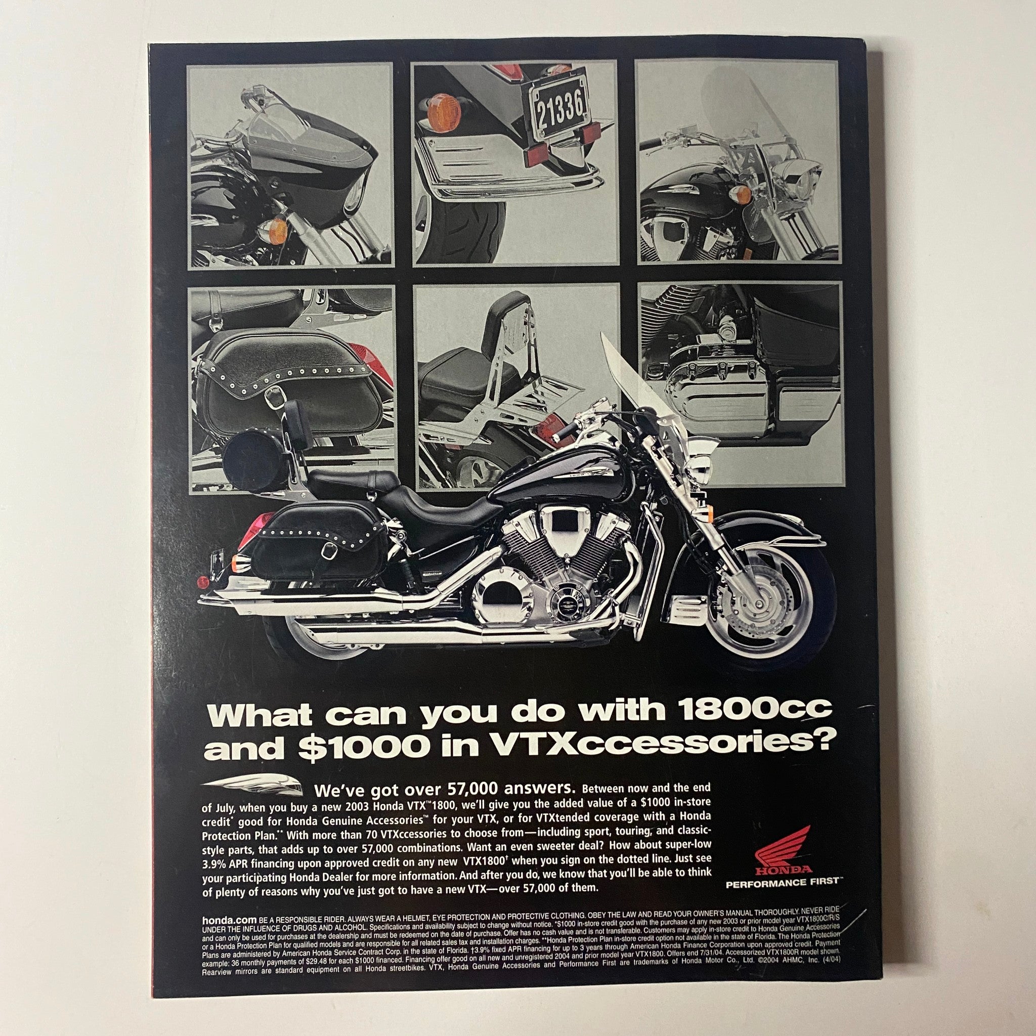 Back cover of Muscle & Fitness Magazine July 2004 Vol 65 No. 7 featuring a promotional image for VTX accessories, highlighting motorcycle accessories and features.