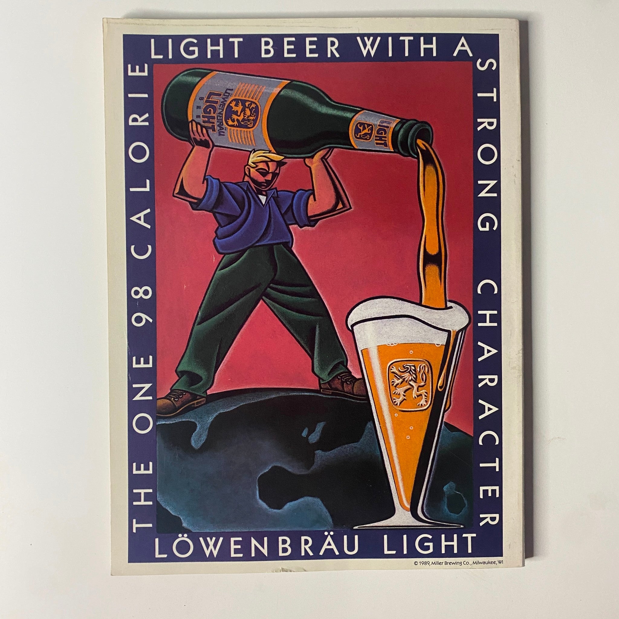 Vintage advertisement for Löwenbräu Light beer showcasing a man pouring beer into a glass with a strong emphasis on its low calorie count.