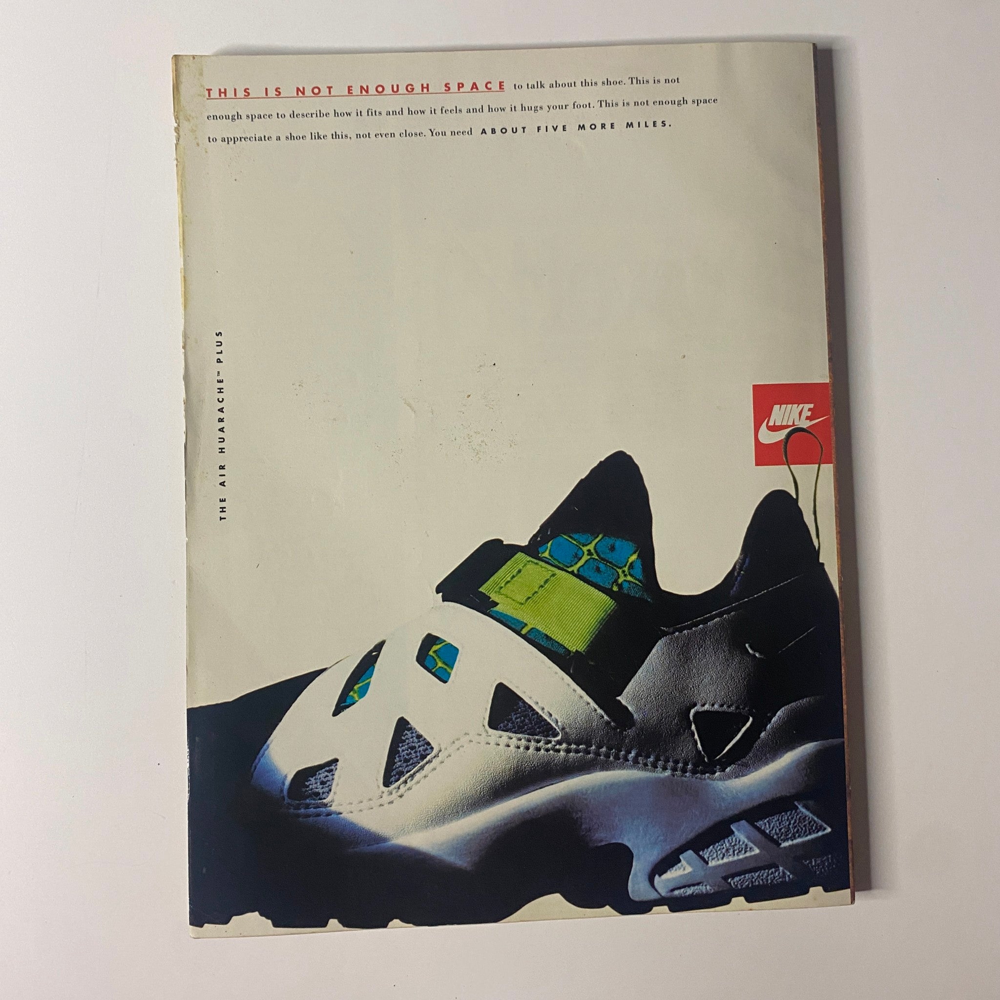 Back cover of Muscle & Fitness Magazine September 1993, displaying a Nike shoe advertisement with a minimalist design and bold colors.