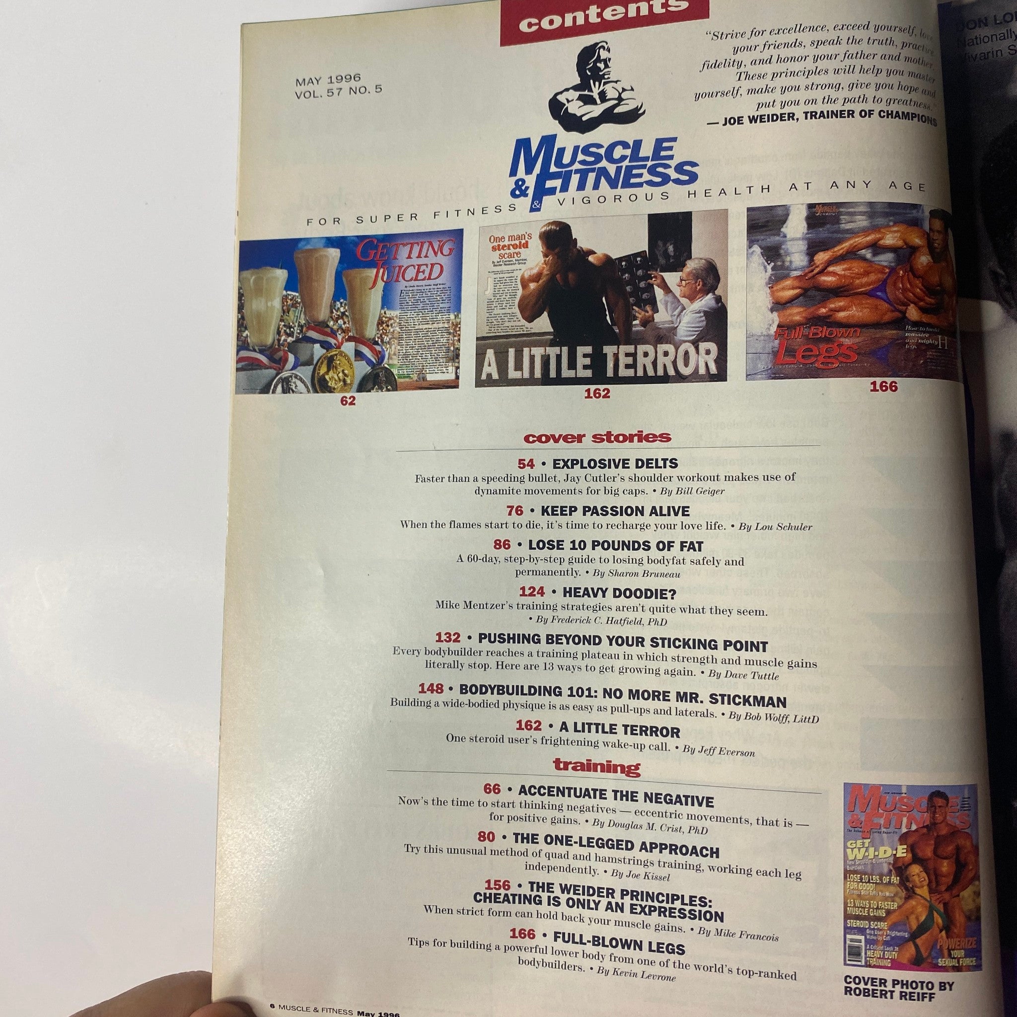 Inside contents page of Muscle & Fitness Magazine May 1996 featuring poster spread on explosive delts workout and articles on bodybuilding techniques.