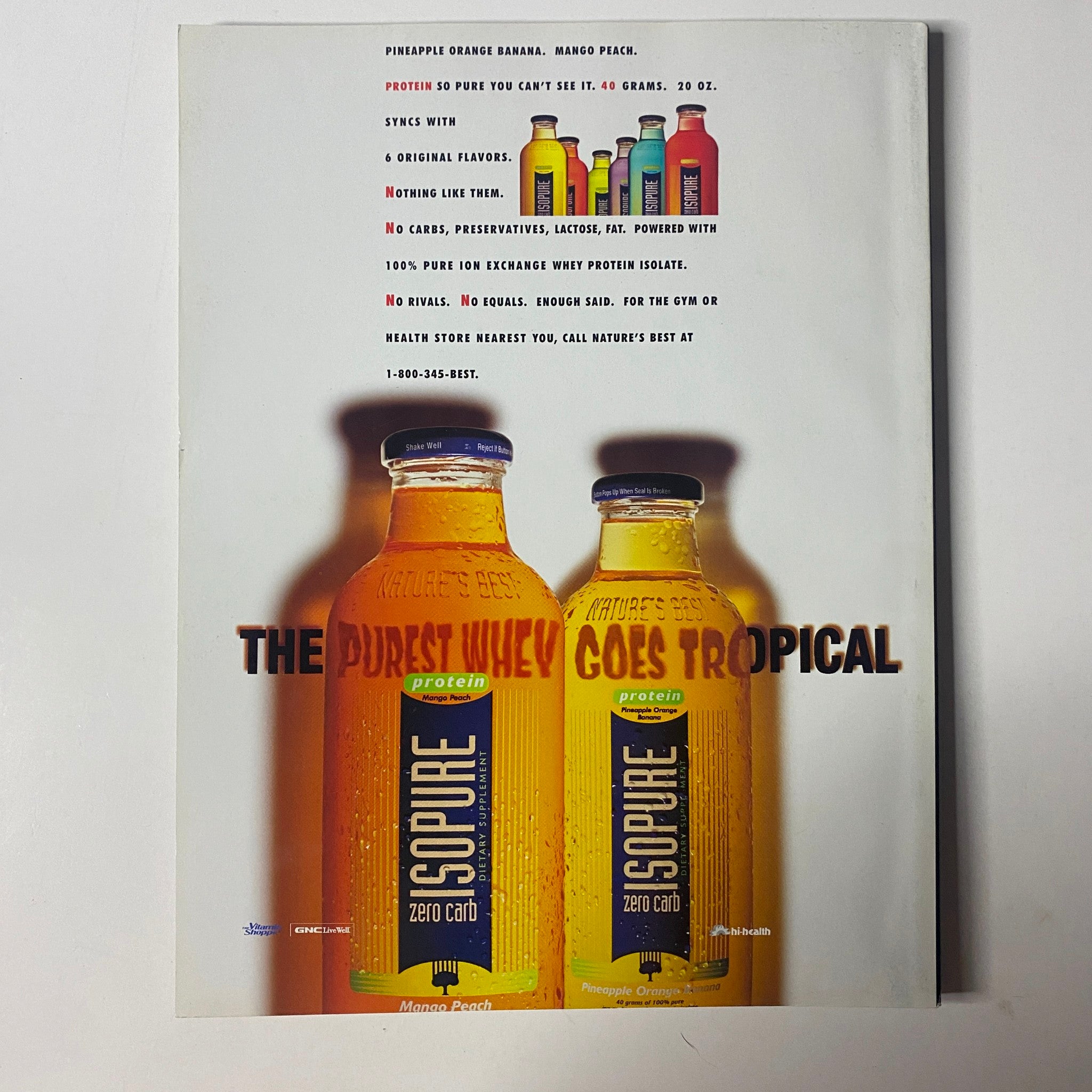 Advertisement for Muscle & Fitness Magazine December 2004 featuring protein drink Squeeze with a vibrant orange and mango packaging, illustrating the tagline 'The Purest Whey Goes Tropical'. The magazine is noted for its focus on fitness and nutritional products.