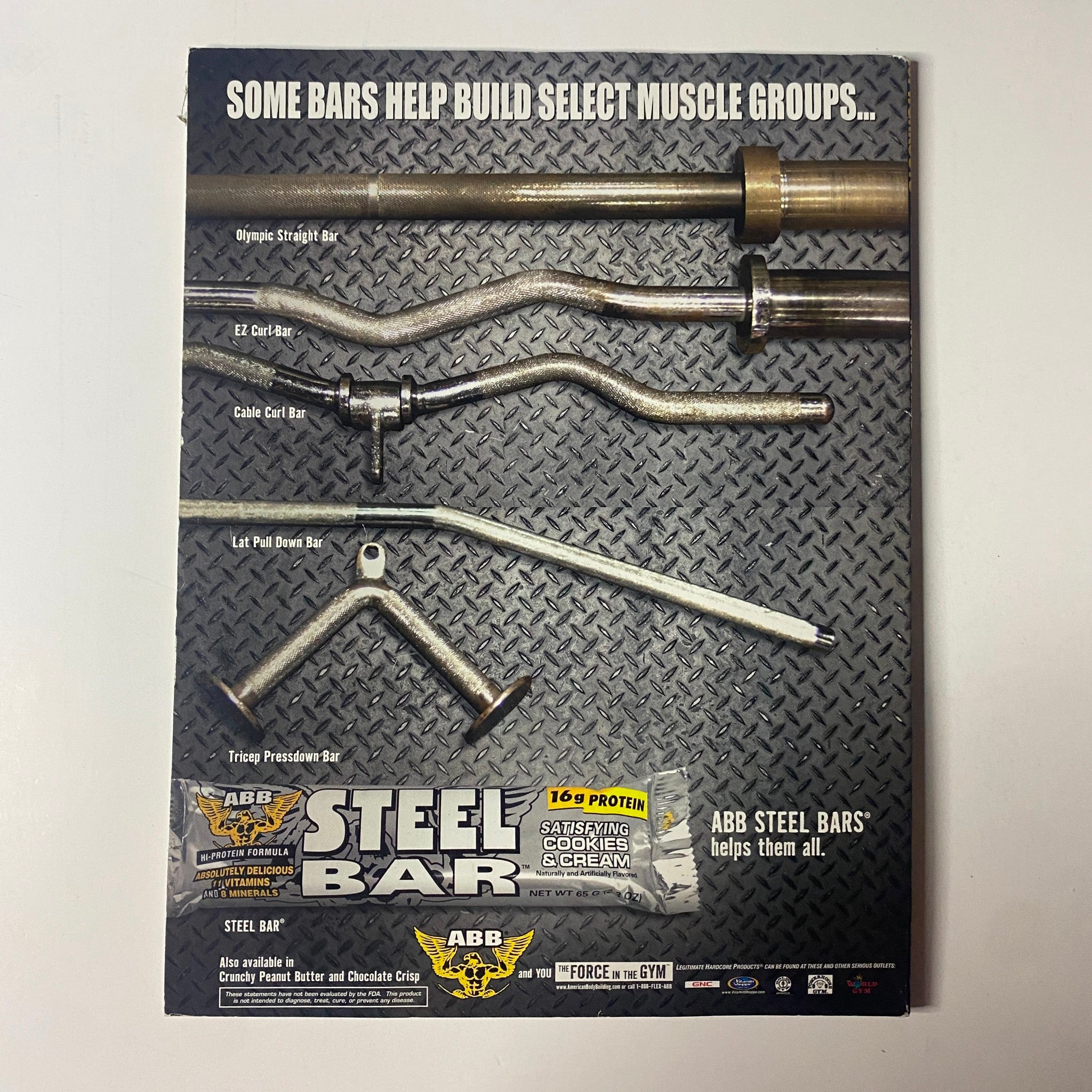 Back cover of Muscle & Fitness Magazine 2004 highlighting ABB Steel Bars for strength training, including images of different bar types for workouts.