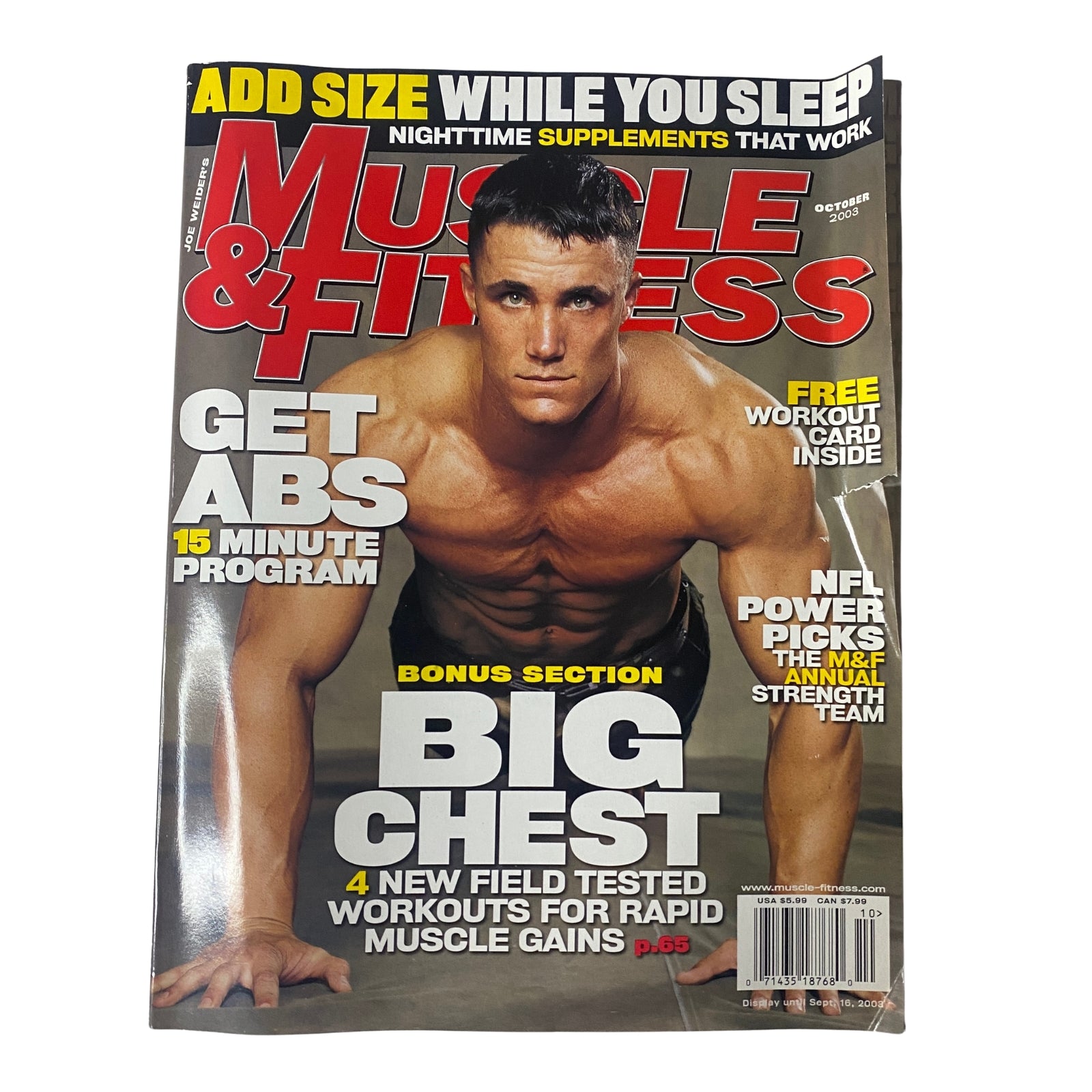 Muscle & Fitness Magazine October 2003 Vol 64 No. 10 featuring Greg Plitt on the cover, showcasing a fitness model posing, emphasizing bodybuilding and muscle gains.