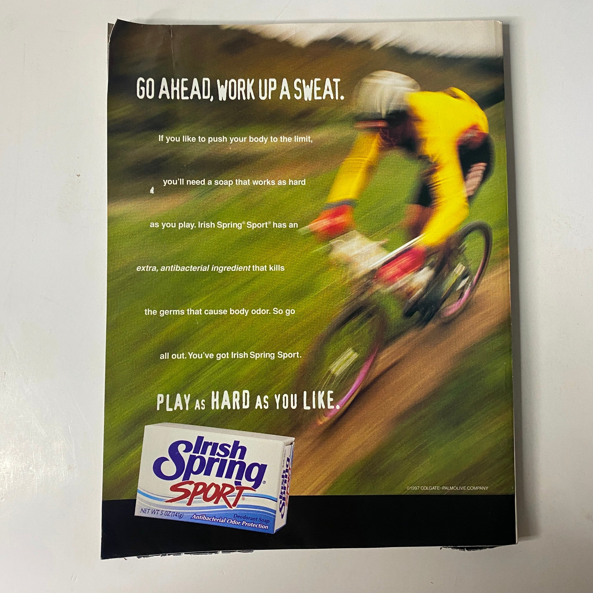 Promotional ad for Irish Spring Sport from Muscle & Fitness Magazine, October 1998, emphasizing the product's antibacterial properties for active lifestyles.