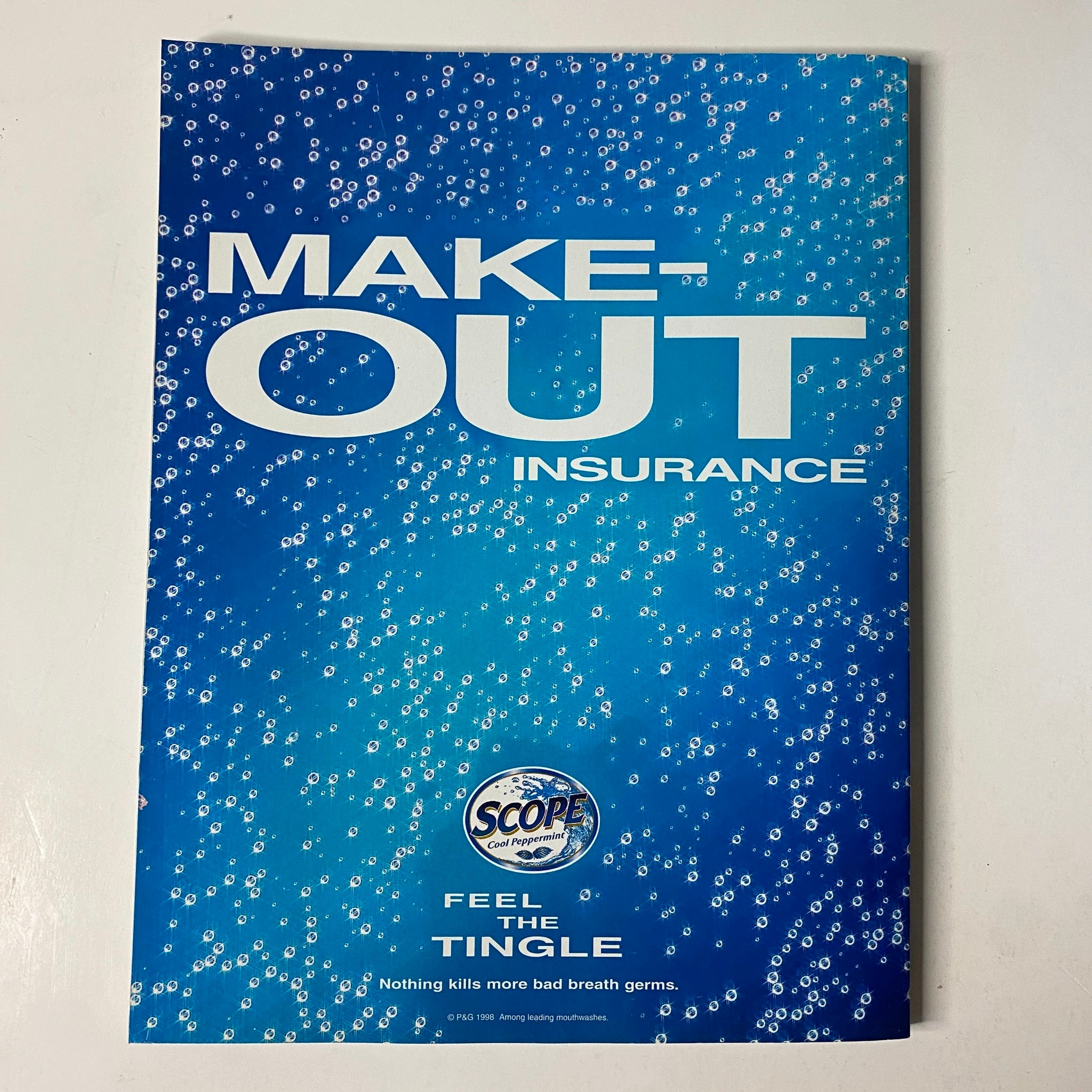 Advertising page for Scope's Make-Out Insurance promoting fresh breath, featured in Muscle & Fitness Magazine March 2000 with Pasi Schalin and Latonia Galloway on the cover.