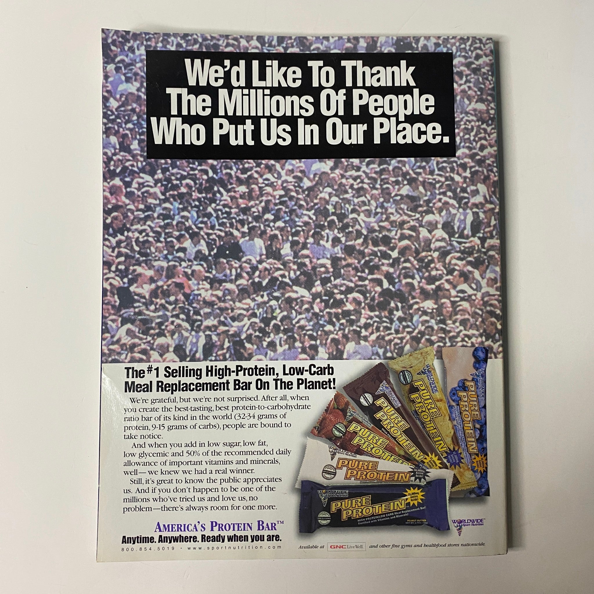 Advertisement in Muscle & Fitness Magazine July 2000 thanking supporters and promoting high-protein meal replacement bars as a top-selling product.
