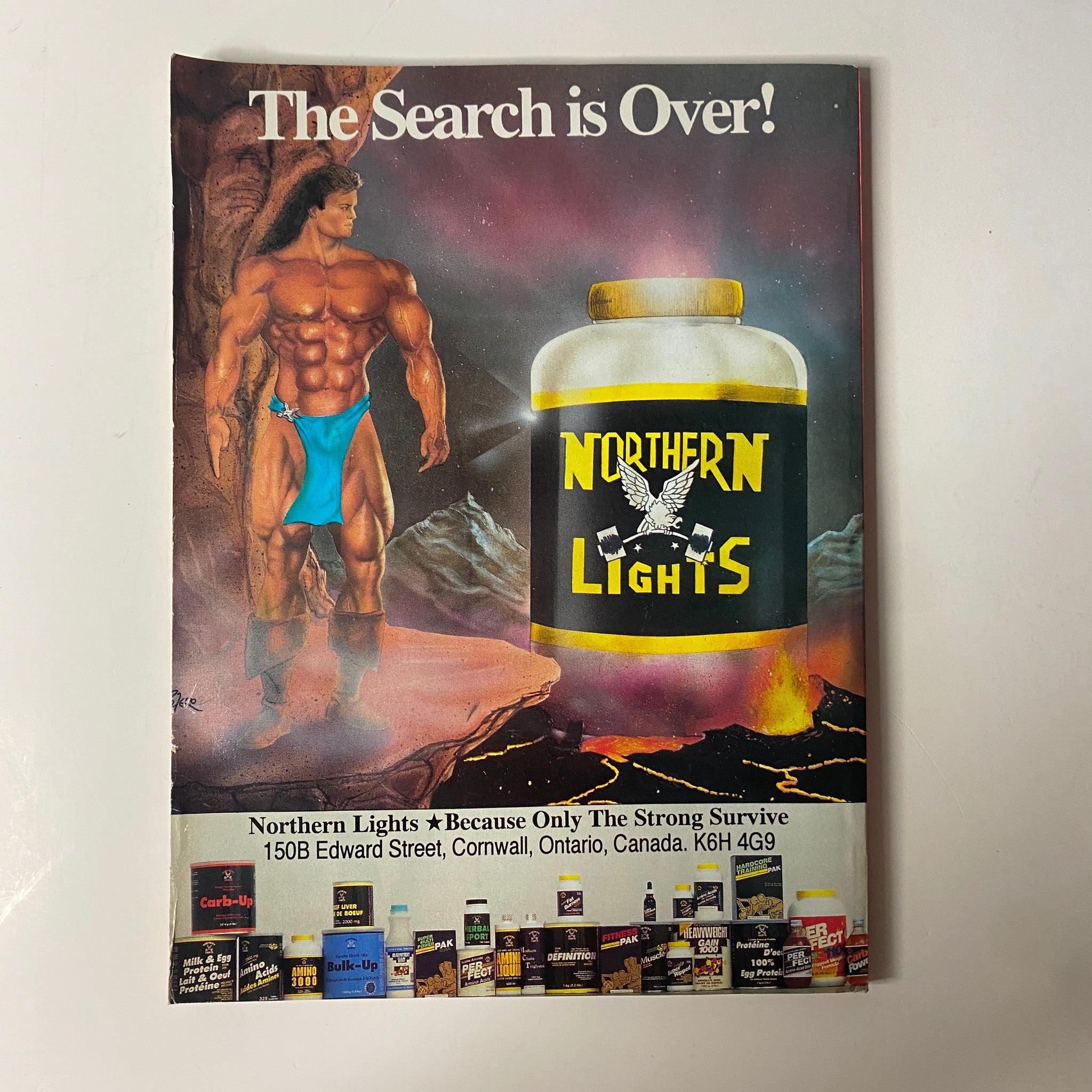 Advertisement from January 1992 MuscleMag International Magazine showcasing Northern Lights supplements with a muscular character, promoting fitness products.