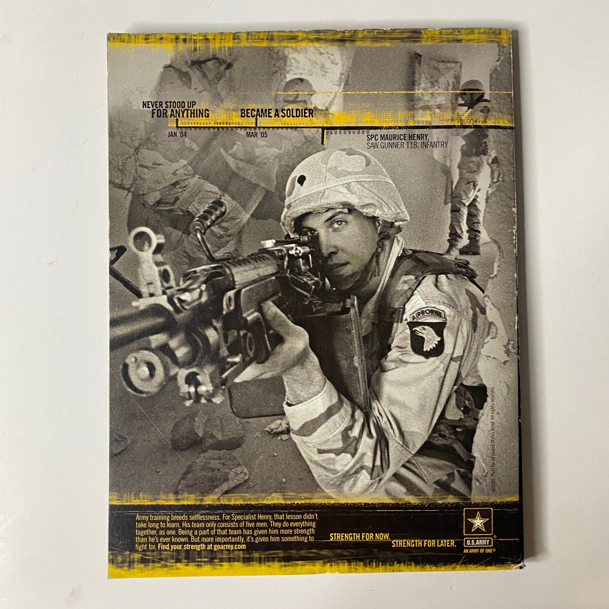 Advertisement page from Muscle & Fitness Magazine October 2005, Volume 66, No. 10 showcasing U.S. Army recruitment, featuring a soldier aiming a rifle and emphasizing the theme of strength and resilience.