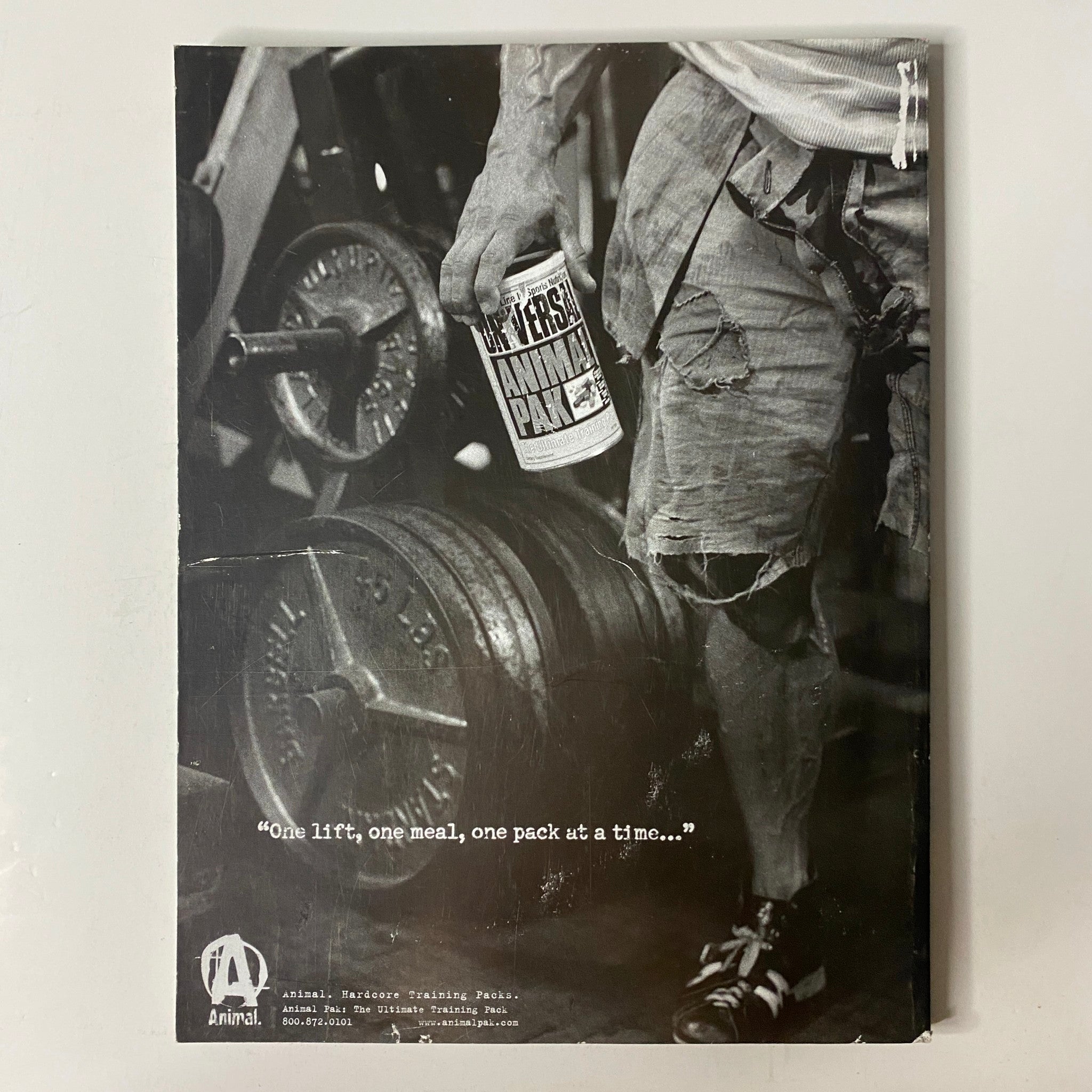 Back cover of Muscle & Fitness Magazine June 2005 Vol 66 No. 6 displaying a fitness supplement advertisement with a motivational quote about training.