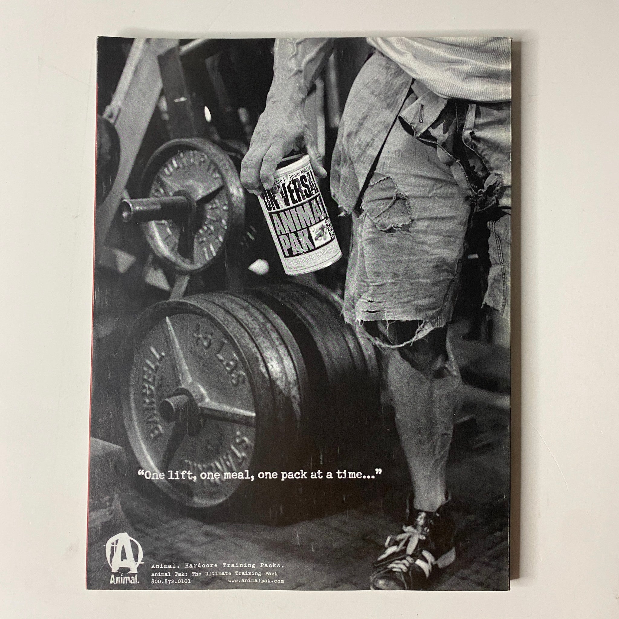 Back cover of Muscle & Fitness Magazine June 2006, displaying a motivational message alongside fitness supplements.