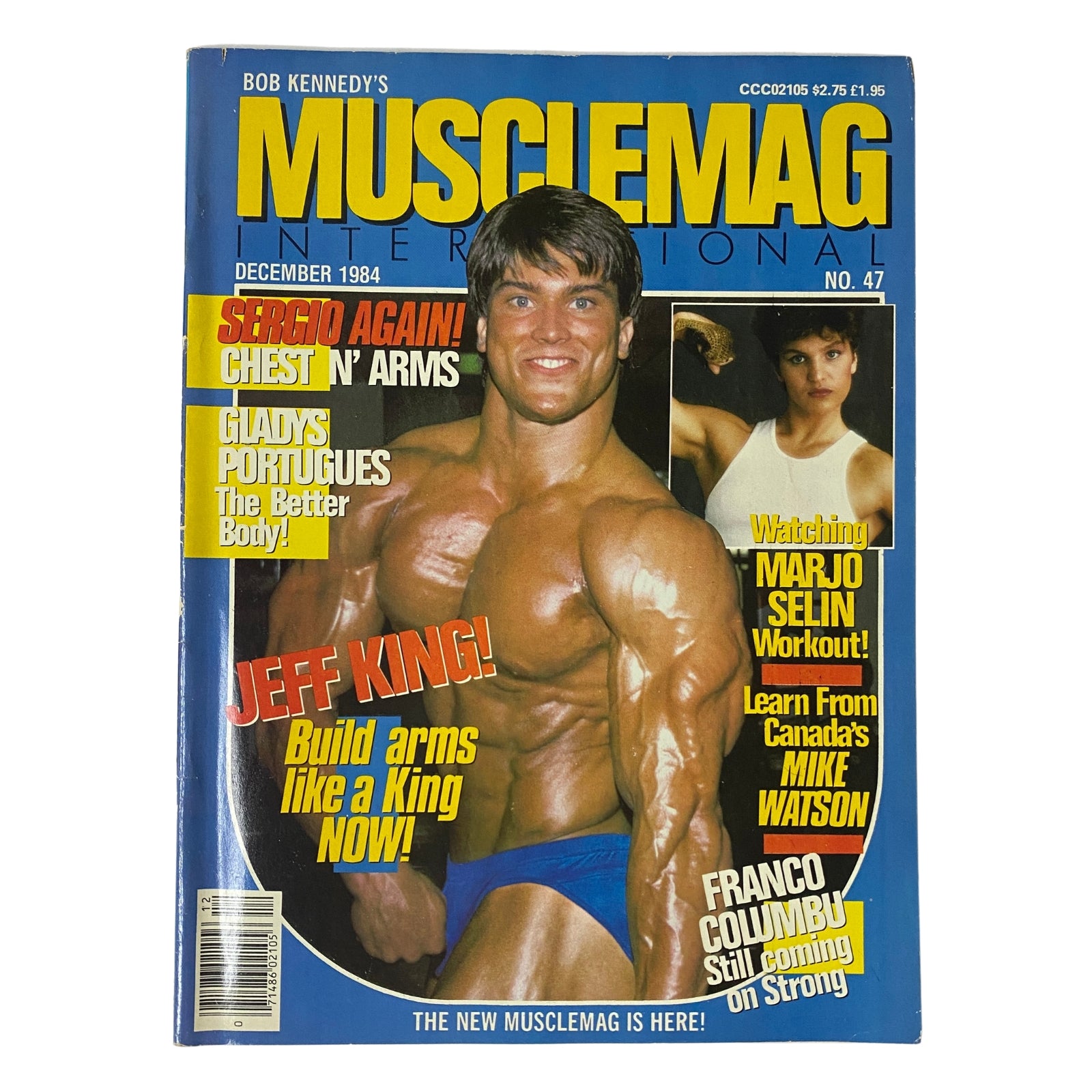 Cover of MuscleMag International Magazine December 1984 No. 47 featuring Jeff King showcasing impressive arm development and highlights of articles about Sergio Oliva, Franco Columbu, and Marjo Selin.