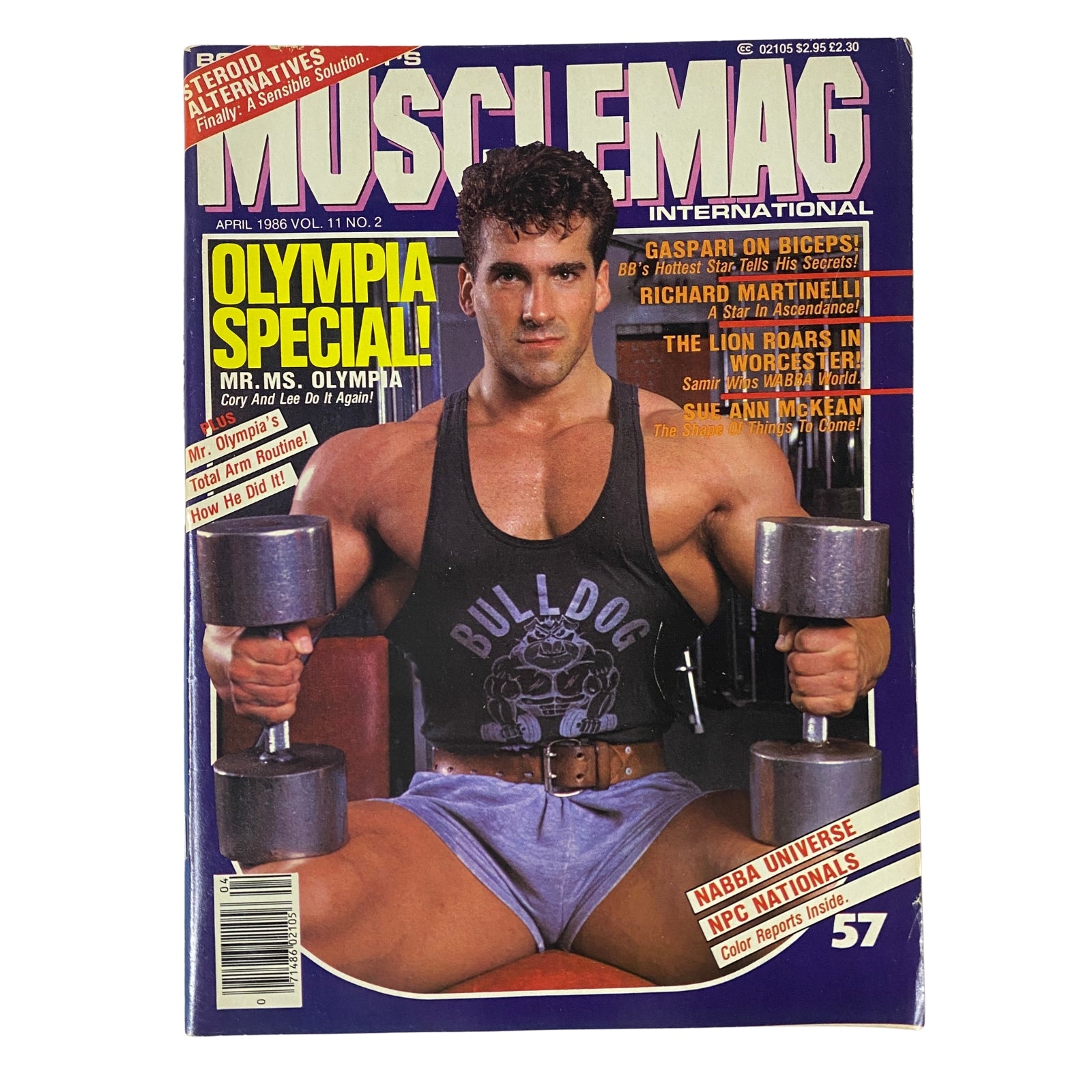 Cover of MuscleMag International Magazine April 1986 Vol 11 No. 2 featuring bodybuilder Bob Paris holding dumbbells, illustrating fitness and bodybuilding culture.