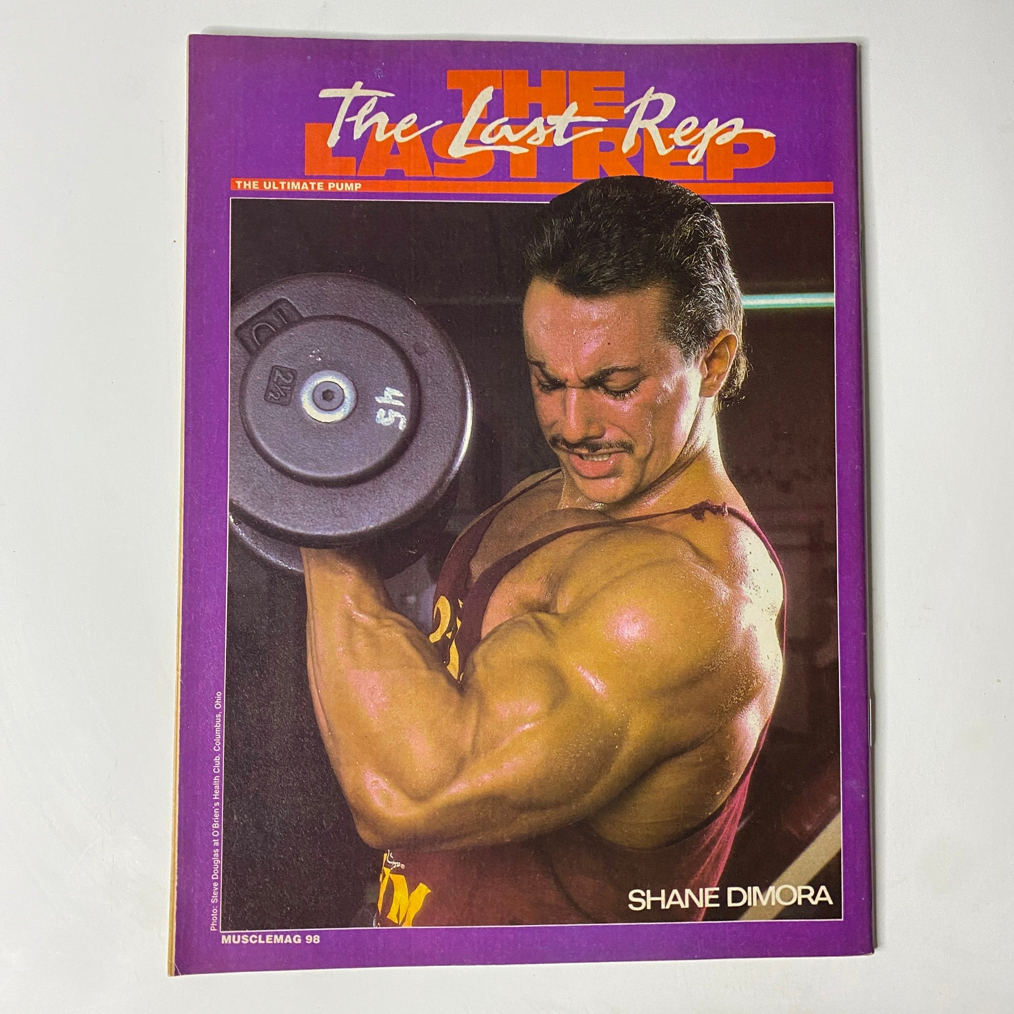 MuscleMag International Magazine February 1987 cover page showcasing Shane Dimora in a bodybuilding pose, representing 'The Last Rep' with a focus on strength training.