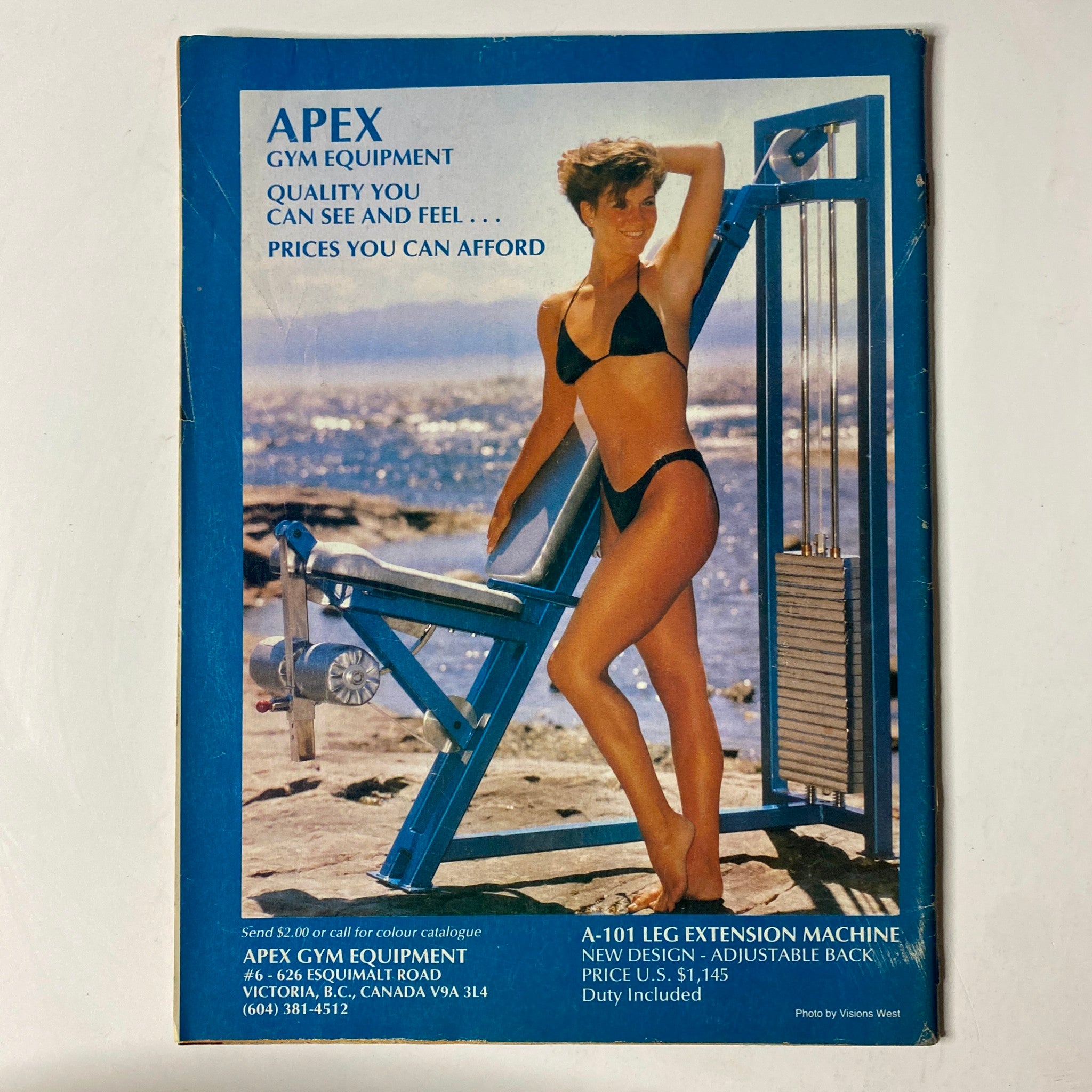 Back cover of MuscleMag International Magazine May 1988 No. 74 advertising APEX Gym Equipment with a model posing in swimwear, emphasizing fitness and health.
