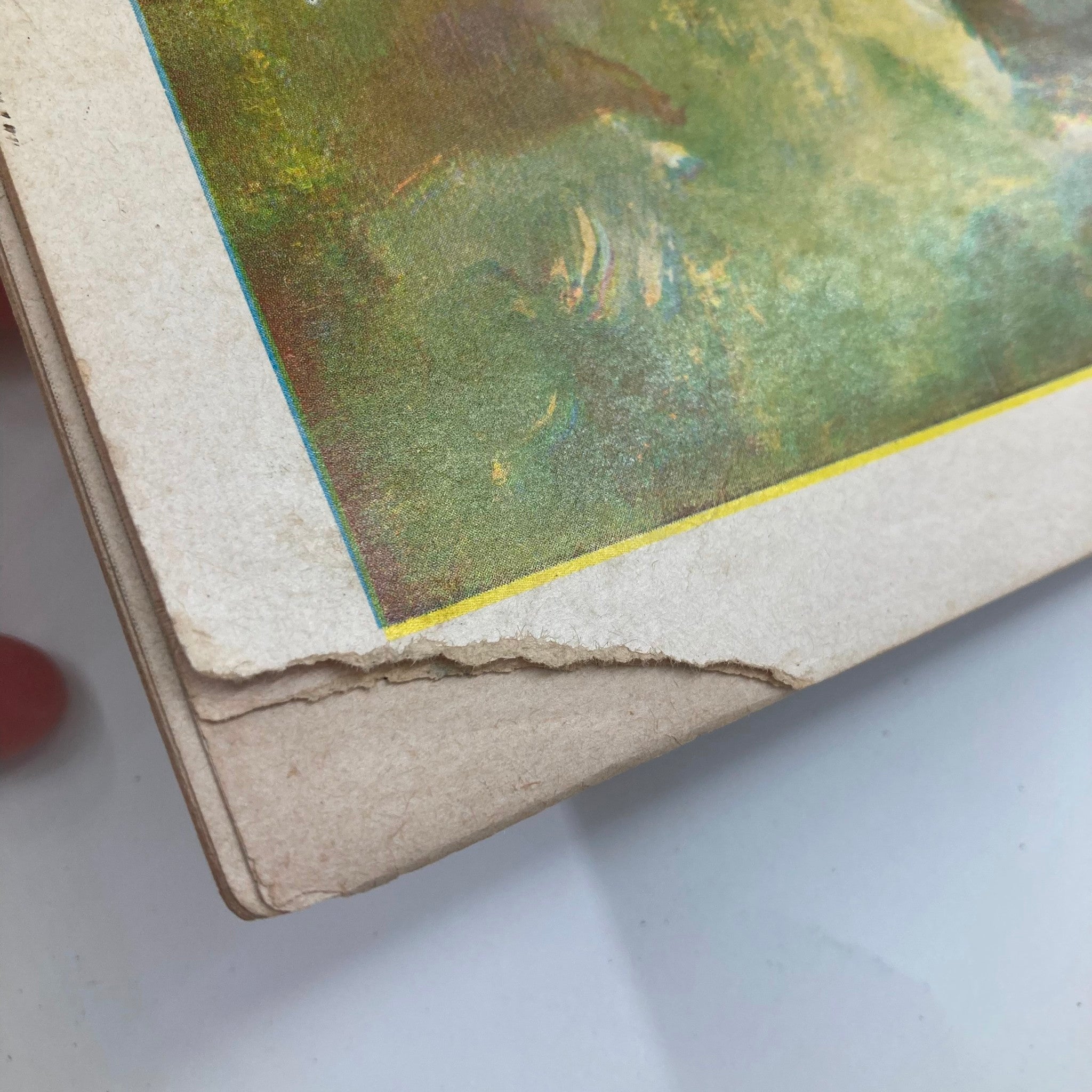 Close-up view of the edge of VTG Paris Life Magazine January 1953, displaying wear and tear that adds to its vintage charm.
