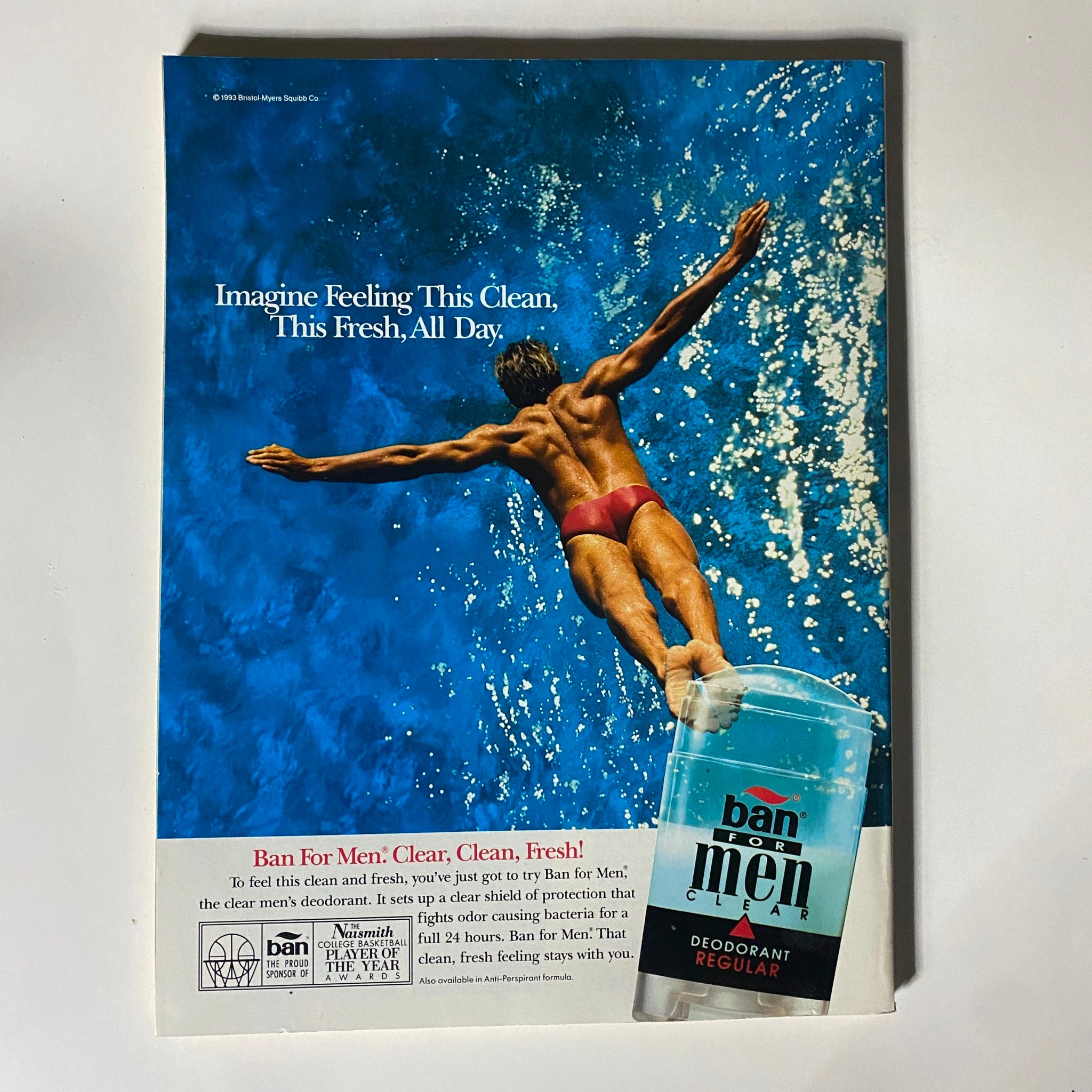 Back cover of Street & Smith's College/Prep Basketball 1993-1994 with an advertisement for Ban for Men deodorant, featuring a swimmer diving into a blue pool, promoting freshness and cleanliness.