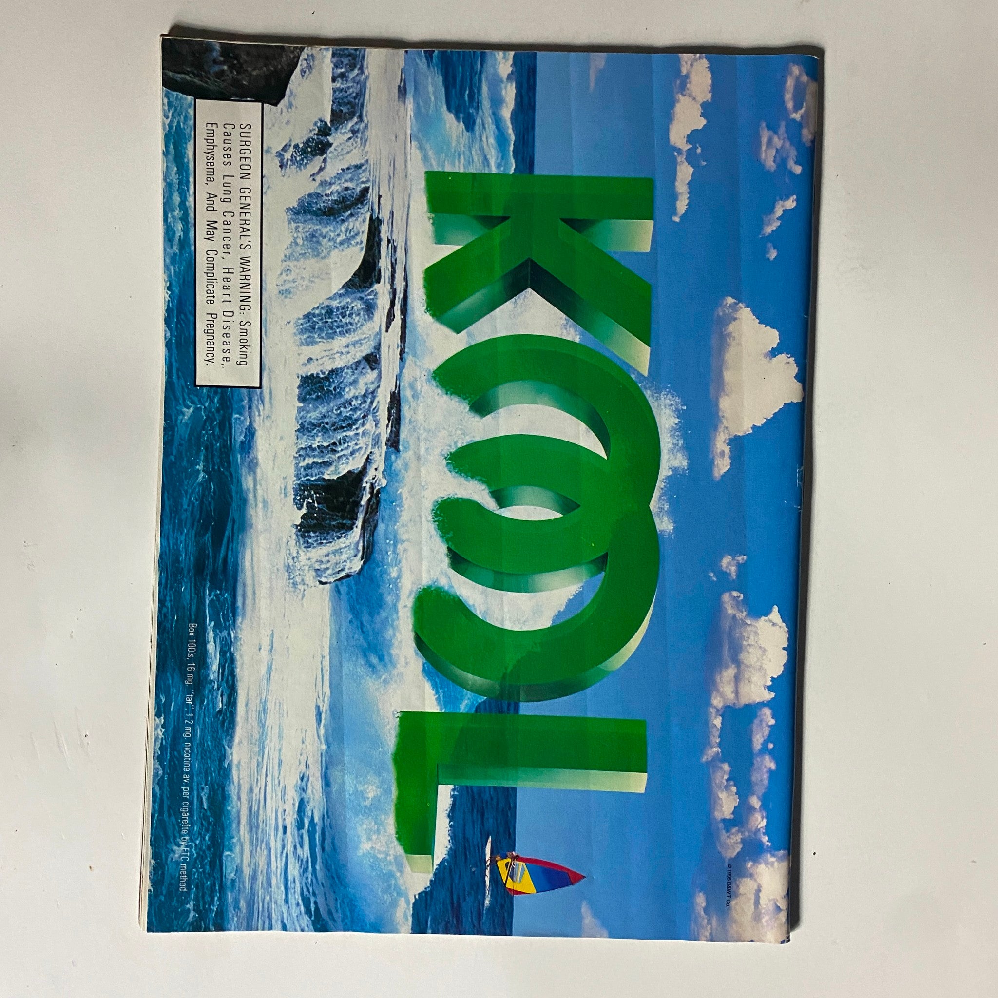 Ad page from Today's Black Woman Magazine, October 1996 showcasing a colorful Kool advertisement with coastal imagery.
