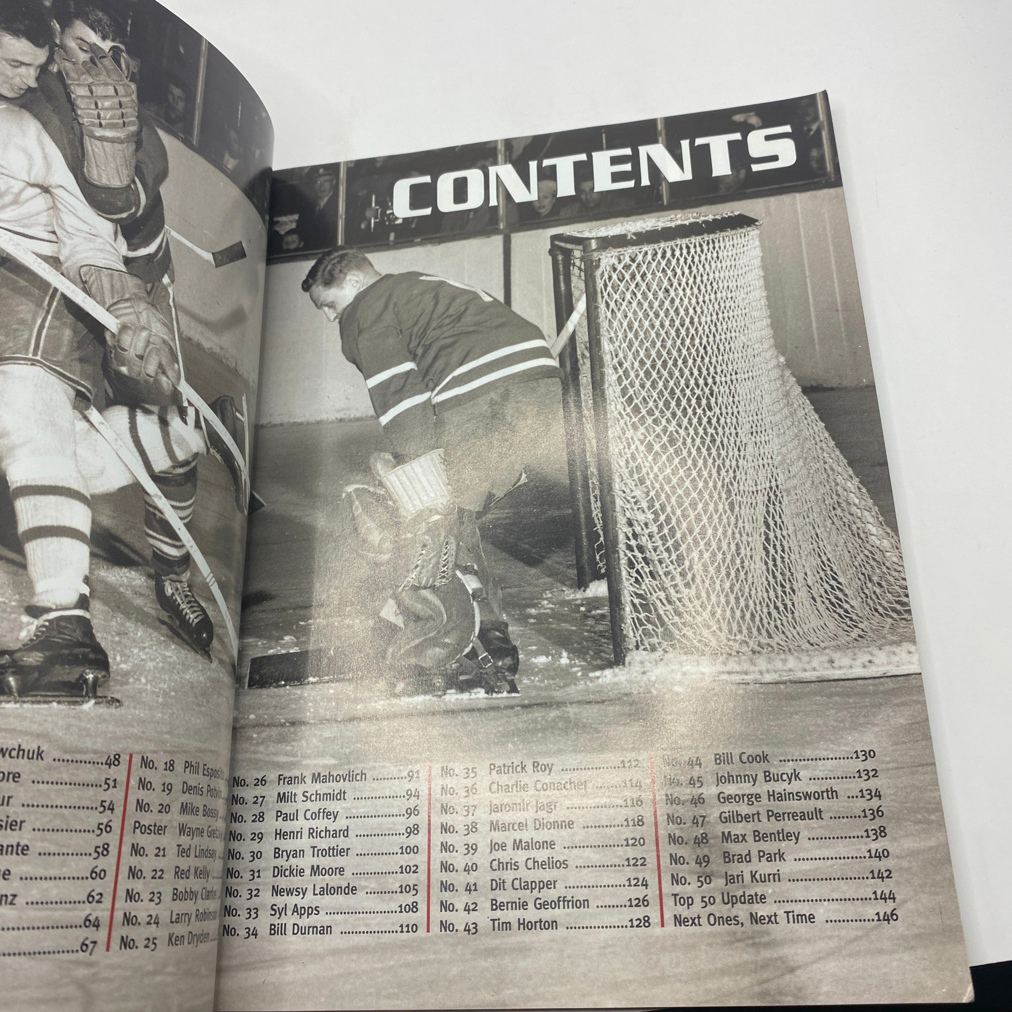 Another inside page from The Hockey News Collector's Issue 1997 revealing the contents. This image features classic hockey action with players and highlights major contributors to the sport, reflective of its rich history.