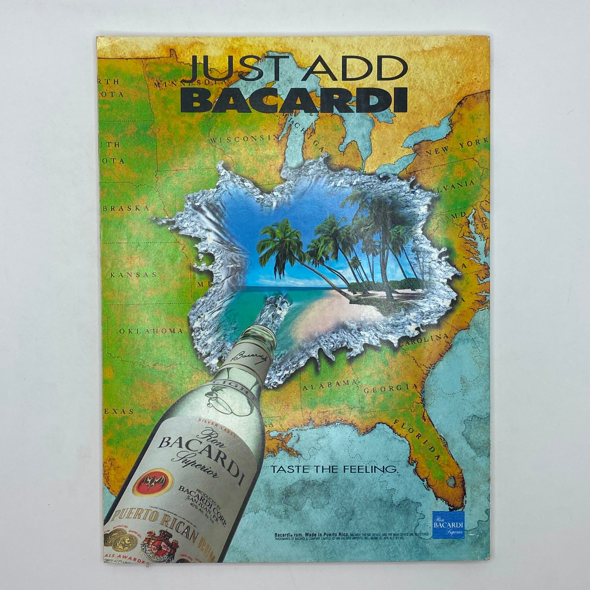 Cover of a promotional magazine titled 'Just Add Bacardi' showcasing a tropical scene with a Bacardi bottle, highlighting the brand's theme of enjoying life and cocktails.