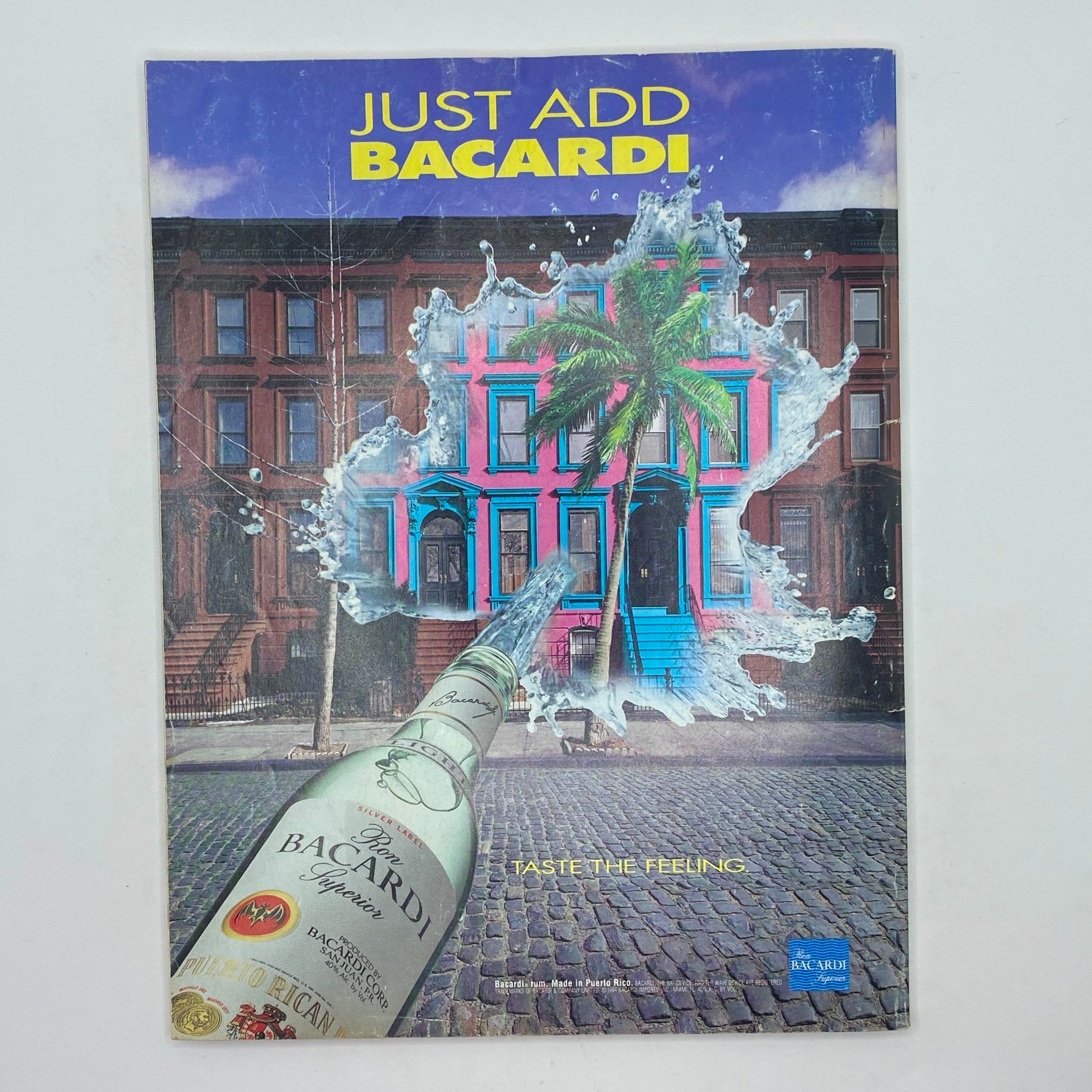 Back cover of an advertisement featuring a Bacardi promotion, creatively designed with vivid imagery, part of the Street & Smith's Pro Basketball Magazine 1994-1995.
