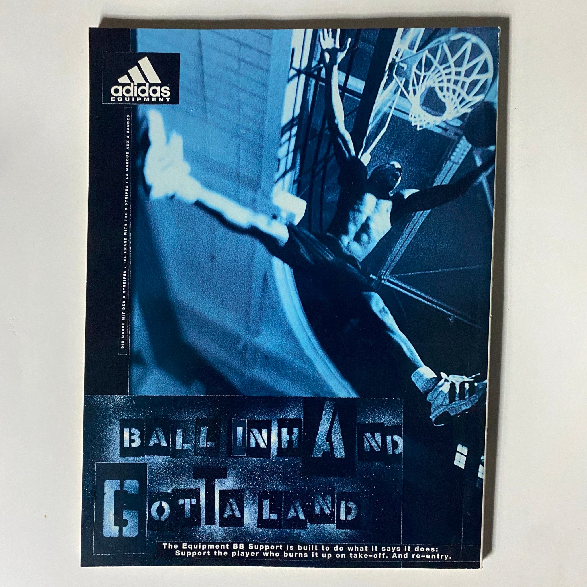 Promotional page for Adidas featuring a basketball player in action, captures the energy of basketball with a bold design, relevant to Dick Vitale's College Basketball 1995-1996 Preview.