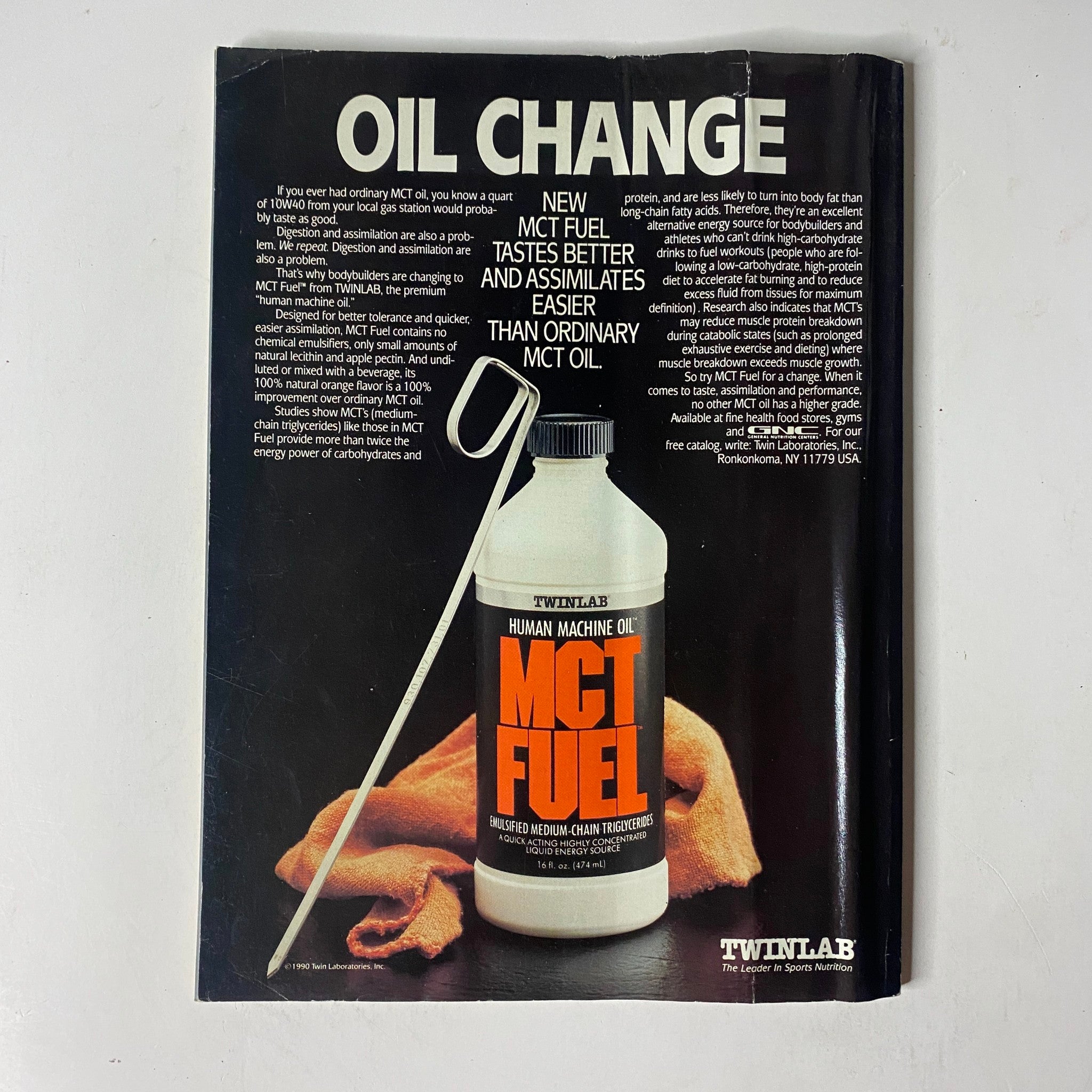 Back advertisement for MCT Fuel in MuscleMag International Magazine November 1990, promoting nutritional supplements for bodybuilders.