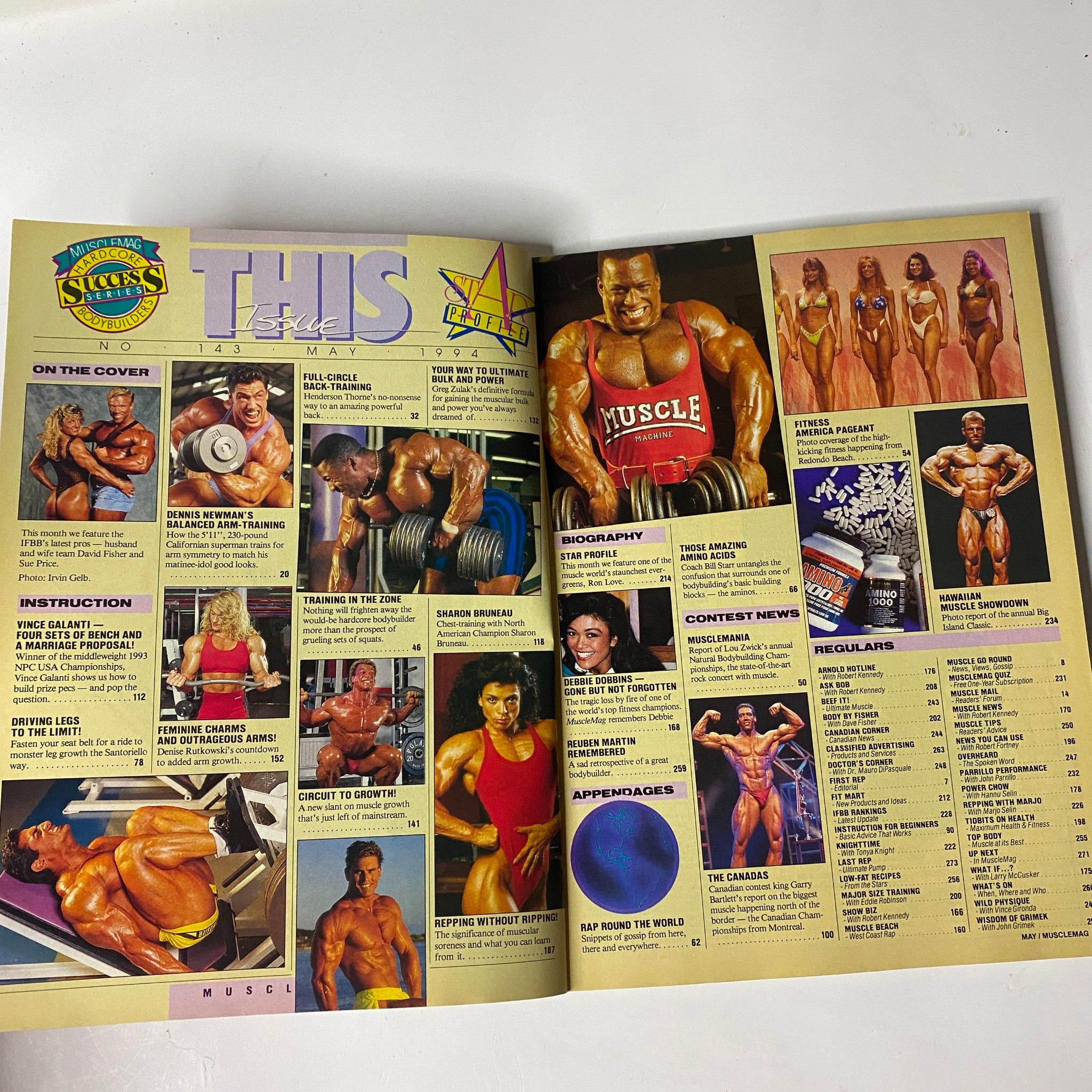 Inside spread from MuscleMag International Magazine May 1994 No. 143 showcasing various bodybuilding content including profiles, training tips, and contest news.