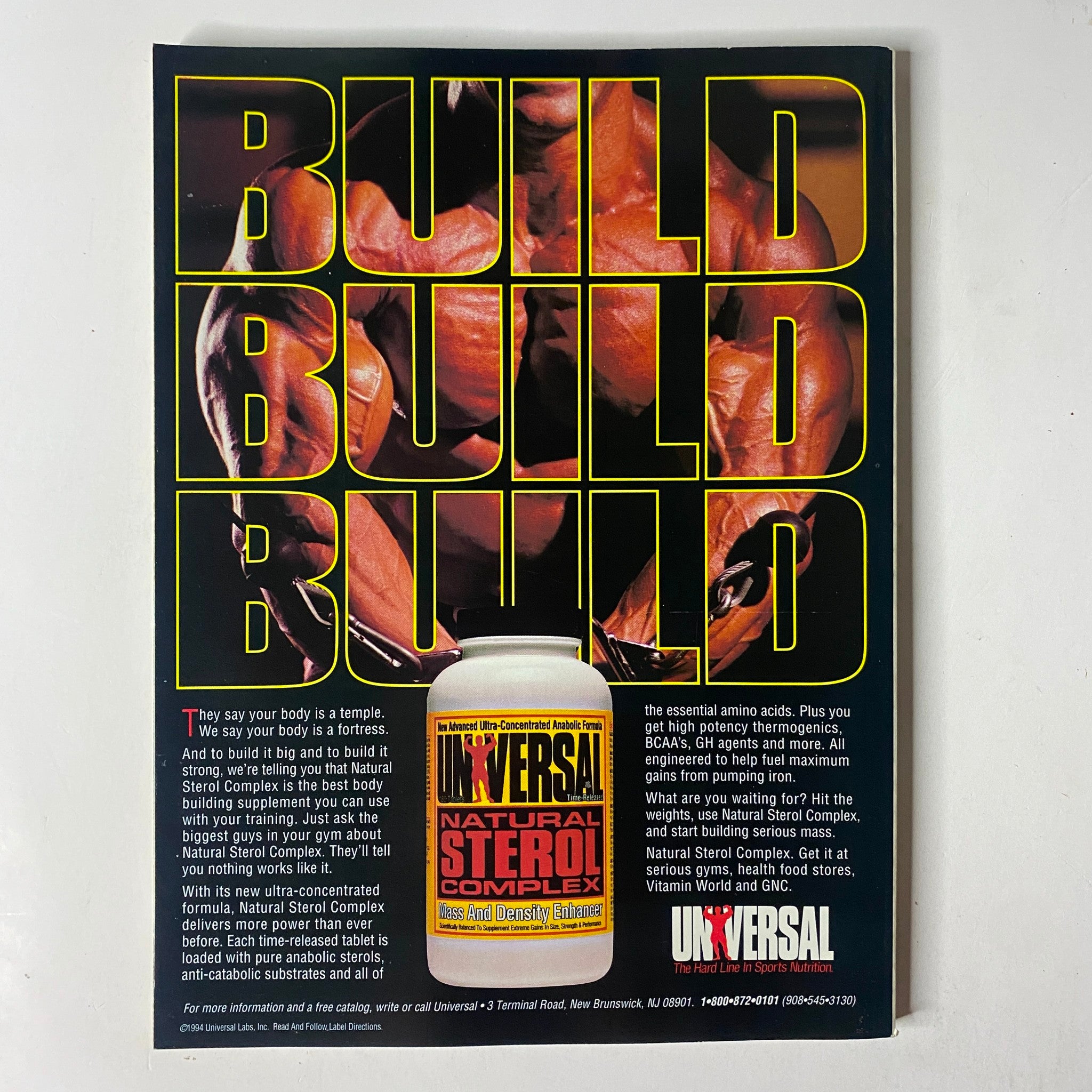 Advertisement from MuscleMag International Magazine August 1994 Issue No. 146 promoting Universal's Natural Sterol Complex with the text 'BUILD BUILD BUILD' emphasizing bodybuilding supplements.